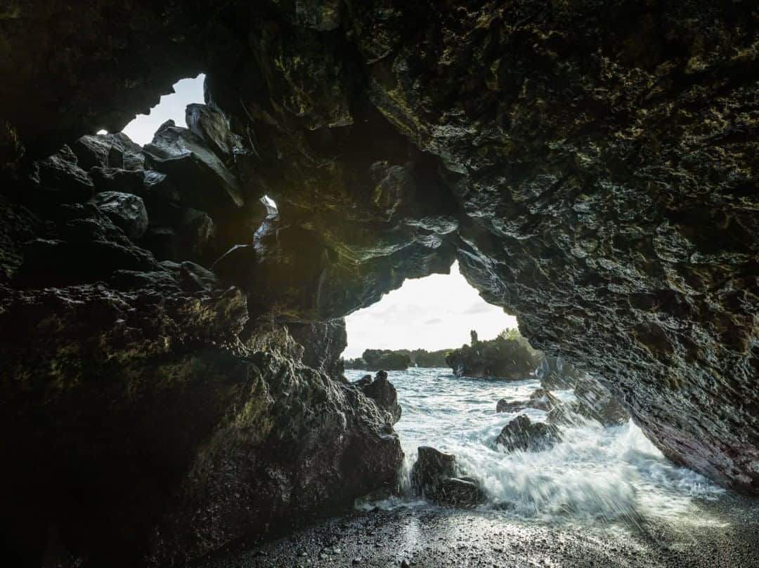 National Geographic Travelさんのインスタグラム写真 - (National Geographic TravelInstagram)「Photo by @michaelclarkphoto  Waves break at a cave next to a black sand beach at Waianapanapa State Park near Hana, Maui. #maui #hawaii #waianapanapa #hana」8月12日 1時07分 - natgeotravel