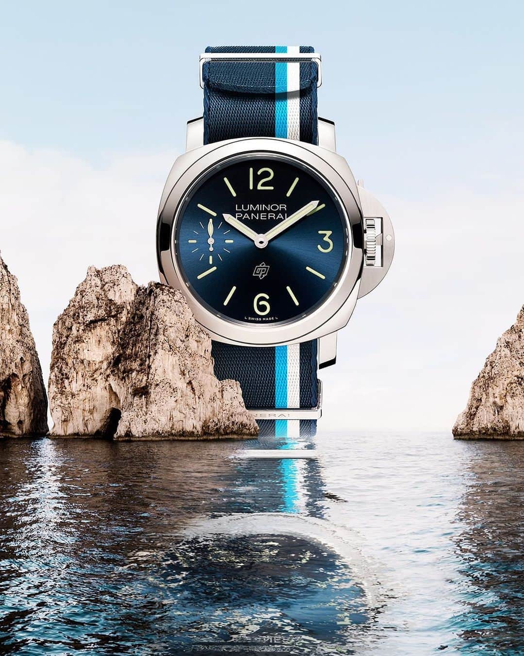 のインスタグラム：「Upgrade your look, upgrade your summer.   Add a Nato strap to your Luminor Blu Mare, the expertly crafted seatbelt-style feature for your Panerai watch.   #Panerai #PamCast #PaneraiExperience #Luminor #PaneraiLuminor #pamily #paneristi #risti #watchfam #Watchuseek #BlueDial #paneraistrap #paneraiwatch #paneraipics #watchshot」