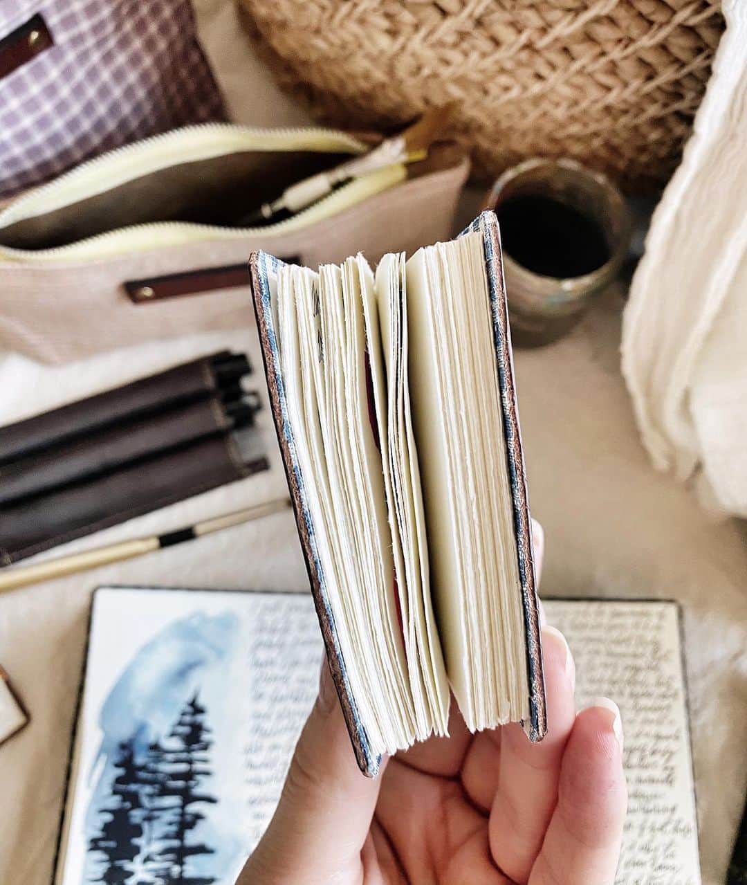 Catharine Mi-Sookさんのインスタグラム写真 - (Catharine Mi-SookInstagram)「“To me, reading through old letters and journals is like treasure hunting. Somewhere in those faded, handwritten lines there is a story that has been packed away in a dusty old box for years.” -Sara Sheridan . . . I have my very first journal and the last several but long gone are the memoirs in between. I went through several years voraciously writing only in composition books, and upon completing one, I’d burn it to commence the start of another. Many are aghast at such a notion but I do not regret those lost remnants for they taught me how to release and let go and start anew. But as I’ve grown and evolved, I’ve started a new ritual of keeping my memoirs safely stowed in the hopes that one day my little one will find connection, laughter, comfort, lore, wonder, possibility, understanding and being understood in a way my role as mother might not be able to reach, but where our humanity may meet in these pages. . . . Do you keep your journals? Or do you let them go? What are your rituals with such? . . . Featuring the Model 25 Mayan Blue Fountain Pen & Three Pen Insert @franklinchristoph. Jackson Journal, Mini Harper Journal (that I use as a watercolor swatch book — flip through coming soon), Antique Textile Pouches (a new release of patchwork ones coming soon!), Tomes & Mini Sendak @pegandawl. Handmade Watercolors @wanderlustwc. . . . #journaling #franklinchristoph #fountainpens #penmenship #pegandawl #leatherjournal #handmadebook #bookbinding #waxedcanvas #pouches #watercolorsketch #wanderlustwc #handmadewatercolors #artjournal #artjournaling #artjournalpages #creativespace #creativejournaling #journalinspiration #watercolordaily #thedailywriting #calligraphylove #theartofslowliving #slowlivingforlife #stationeryaddict #stationerylover #journallove #morningpages」8月13日 3時06分 - catharinemisook