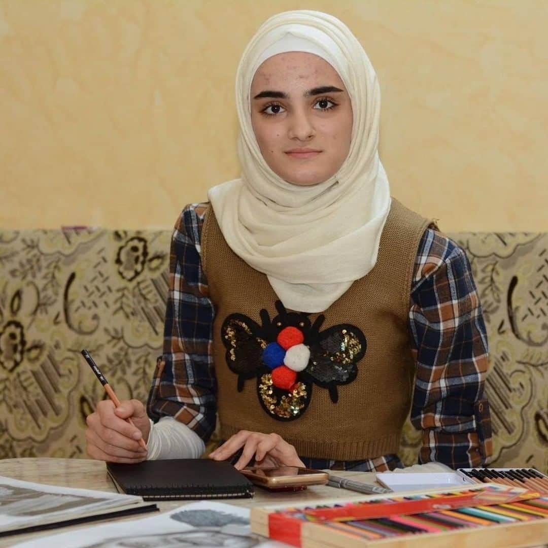 unicefさんのインスタグラム写真 - (unicefInstagram)「For Amal in Syria, staying home is nothing new. Facing limited mobility from hip dysplasia, the 16-year-old was forced to drop out of school as a child because of  a misdiagnosed speech  disorder. Now, with hearing aids and a passion for drawing and learning, she’s taking the #COVID19 lockdown in stride, and finding hope in dark places.   “Amal’s story should be an inspiration for children everywhere,” her older sister says. “They shouldn’t view lockdown as the end of the world; they should find the talents they might have been too busy to discover.”  UNICEF is working with governments across the world to make sure that when schools reopen, they reopen better - and reach the most vulnerable children. © UNICEF Syria」8月13日 7時13分 - unicef