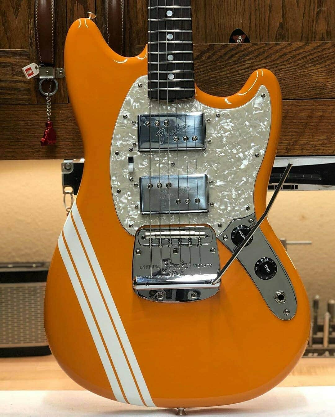 Fender Guitarさんのインスタグラム写真 - (Fender GuitarInstagram)「Start your Monday with this fresh Mustang! Capri orange, racing stripes and wide-range humbucking pickups from the bench of @paul_waller_fender, this is a sight to behold.」9月8日 1時10分 - fender