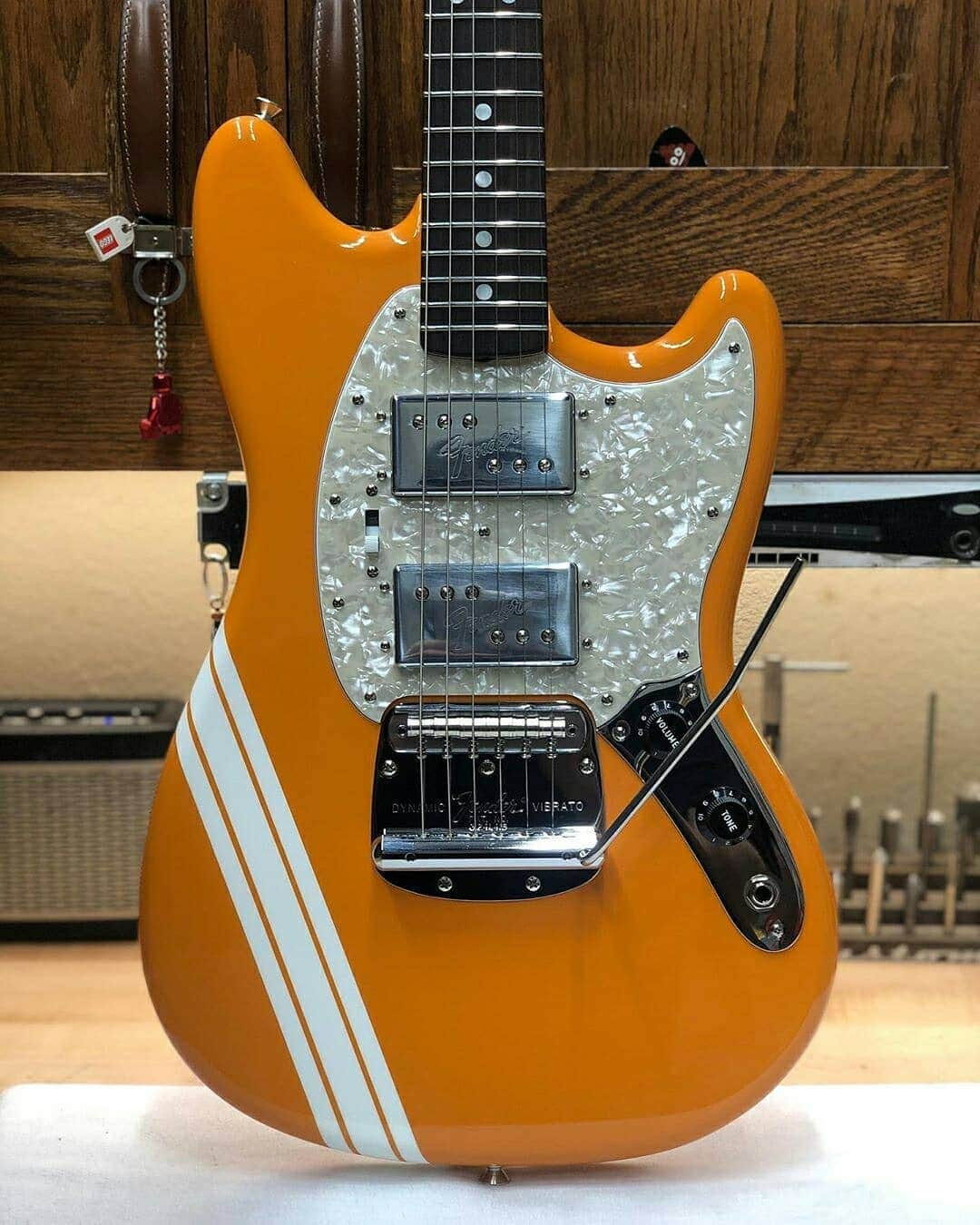 Fender Guitarさんのインスタグラム写真 - (Fender GuitarInstagram)「Start your Monday with this fresh Mustang! Capri orange, racing stripes and wide-range humbucking pickups from the bench of @paul_waller_fender, this is a sight to behold.」9月8日 1時10分 - fender