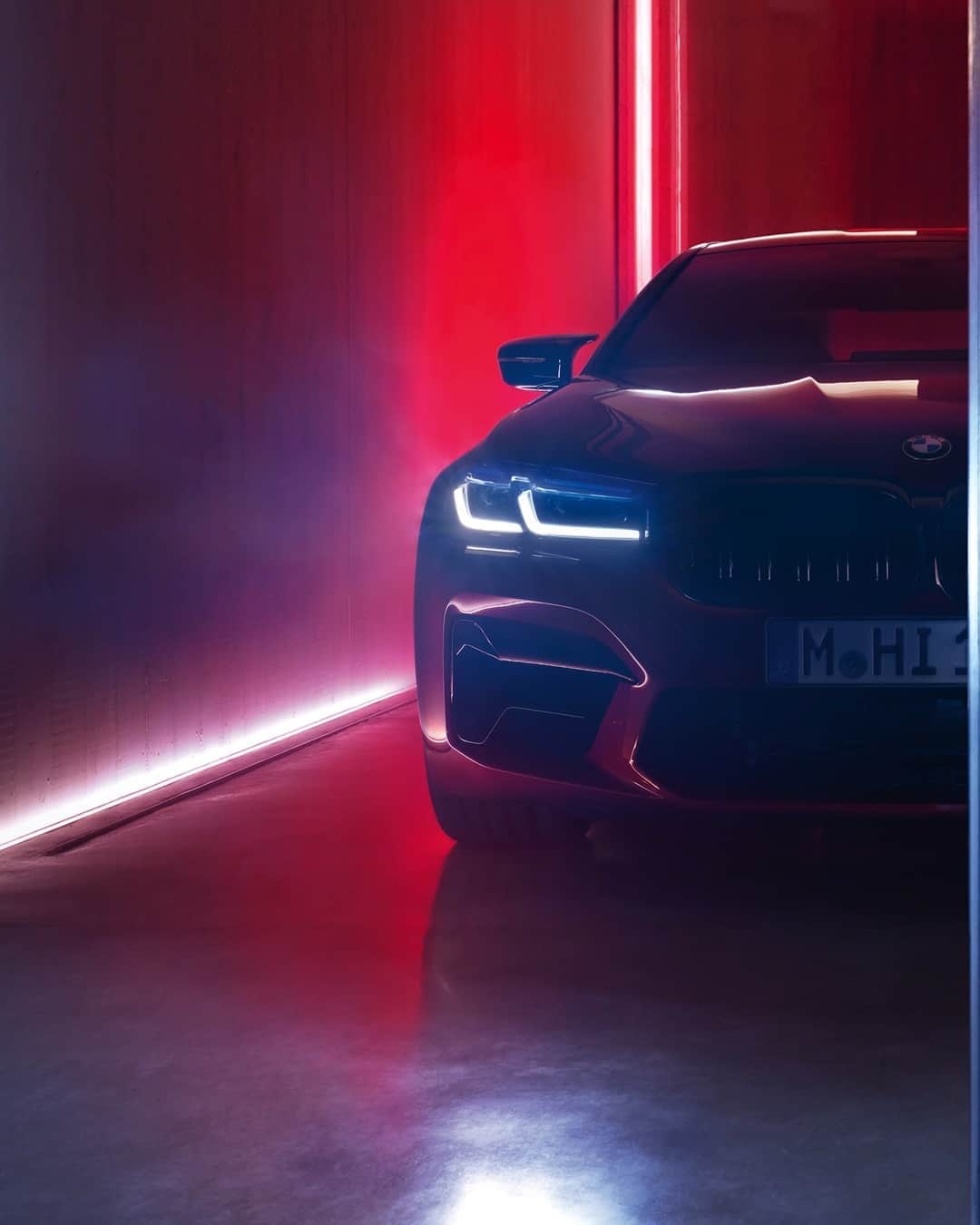 BMWのインスタグラム：「See the light, even in the dark. This is power. The new BMW M5 Competition. #TheM5 #BMW #M5 #BMWM __ BMW M5 Competition Sedan: Fuel consumption in l/100 km (combined): 10.6–10.5. CO2 emissions in g/km (combined): 242–239. Further information: www.bmw.com/disclaimer.  	 Acceleration (0-100 km/h): 3.3 s. Power: 460 kW, 625 hp, 750 Nm. Top speed (limited): 250 km/h (with optional M Drivers Package: 305 km/h).」