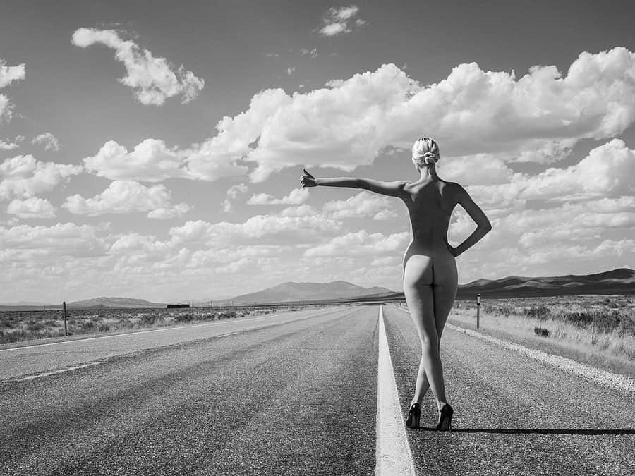 タイラー・シールズのインスタグラム：「Route 66 with @alliemarieevans never have a seen a more empty stretch of road, with the most perfect clouds and perfect moment so on my way home from Idaho we pulled over and took this. We didn’t see a town for hours and not one car for an hour, the desert was ours for a small amount of time. If you swipe right you can see a 30 inch silver gelatin print of this image, which is on its way to Dallas as we speak! This was shot on film with no editing. What do you think about the print?」