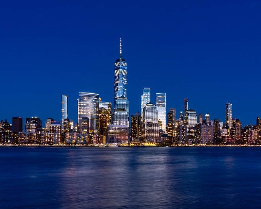 National Geographic Travelさんのインスタグラム写真 - (National Geographic TravelInstagram)「Photo by @stephen_matera  Lower Manhattan and One World Trade Center are seen at dusk from Jersey City, New Jersey. The 104-story One World Trade Center is the tallest building in the Western Hemisphere. The original twin towers were the tallest buildings in the world when they opened in April 1973. Follow me @stephen_matera for more images like this from New York and around the world. #manhattan #newyorkcity #worldtradecenter」9月9日 5時03分 - natgeotravel