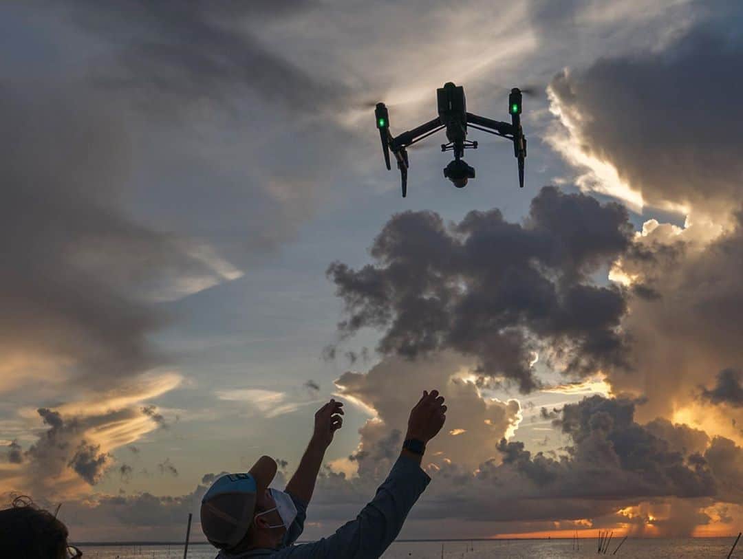 National Geographic Creativeさんのインスタグラム写真 - (National Geographic CreativeInstagram)「Photos by @carltonward  Pre-dawn drone and video work in the Gulf of Mexico fishing community of Cedar Key during our Last Wild Places film expedition for @insidenatgeo. In the first three photos, director of photography @ricksmith_media catches and preps his drone with assistant @leyoho. Fourth photo: director @danny_schmidt captures the launch of the clam boat we were following. Stay tuned for here @carltonward @pathofthepanther and @fl_wildcorridor for more. #FloridaWildlifeCorridor #LastWildPlaces #KeepFLWild」9月8日 23時55分 - natgeointhefield