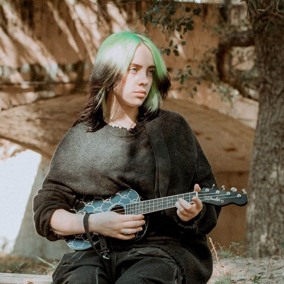 Fender Guitarさんのインスタグラム写真 - (Fender GuitarInstagram)「@billieeilish may be known for her genre-defying pop sound, but it all started for her on an acoustic instrument – the ukulele. Designed with Billie herself – and adorned with her signature “blohsh” symbol – the Billie Eilish Fender Signature Ukulele is the exact model she plays on stage. Hit the link in bio to see it in action and hear the first song Billie ever wrote.」9月9日 2時00分 - fender