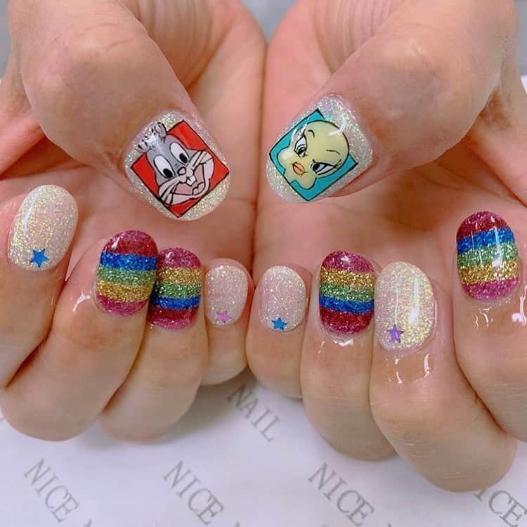 小嶋晶子のインスタグラム：「(◎´艸`{ New nail💅I really like this!  #tweety #tweetynail #bugsbunny #bugsbunnynail #looneytunes #トゥイーティー #トゥイーティーネイル #バッグス・バニー #バッグス・バニーネイル #ルーニー・テューンズ #手描きネイル #💅」