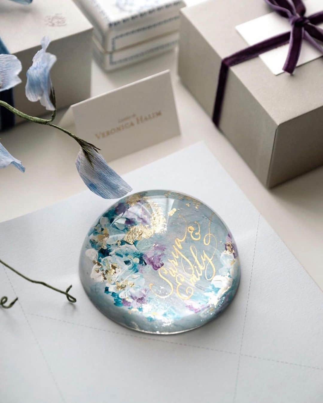 Veronica Halimさんのインスタグラム写真 - (Veronica HalimInstagram)「Personalized for Emily and Surya with matching color palette from their bouquet — #truffypi #paperweight #domeproject #glasspaperweight #personalizedgift #handpainted #painting #madetoorder #mixmedia  #calligraphystyling #tabletop #stationery #カリグラフィースタイリング  #artobject #waterdrop #bespokestationery #bespokegift #personalizedgift #monogram #calligraphylifestyle #artisanmade」9月9日 15時40分 - truffypi