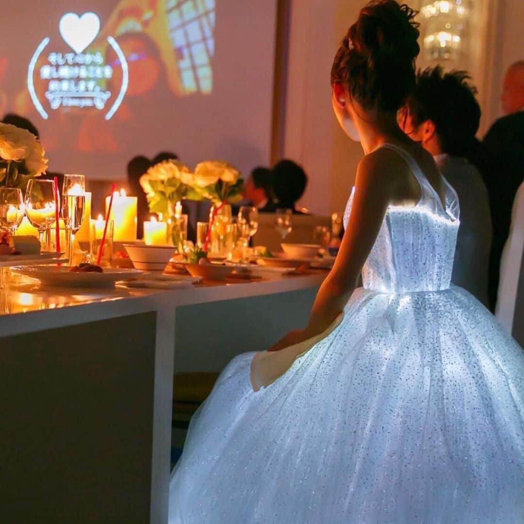 プレ花嫁の結婚式準備アプリ♡ -ウェディングニュースさんのインスタグラム写真 - (プレ花嫁の結婚式準備アプリ♡ -ウェディングニュースInstagram)「魔法にかけられたみたい💕光り輝くシンデレラドレスのphoto9枚👗✨﻿ ﻿ ﻿ ➸➸➸➸➸➸➸💒➸➸➸➸➸➸➸﻿ 💚結婚式のお悩み﻿ 💚式場探しのお手伝い﻿ 💚指輪・ドレスなどショップの提案﻿ ﻿ など＊元プランナーに無料で🏡から相談できる♪﻿ ﻿ LINE相談カウンター： @weddingnews_lines﻿ ➸➸➸➸➸➸➸➸➸➸➸➸➸➸➸➸﻿ ﻿ ﻿ こちらのお写真は @enchanted0606 さんからリグラムさせていただきました🌟ありがとうございました😊✨﻿ ﻿ ﻿ 夜景の中で、美しく輝く﻿ 光る #シンデレラ ドレス👗✨﻿ ﻿ シンデレラが﻿ 魔法にかけられた瞬間を﻿ 再現したかのような﻿ ロマンチックな #ドレス に﻿ 思わずうっとりしちゃいます💕﻿ ﻿ 披露宴後にふたりきりになってから﻿ 撮影されたというカバーphotoも﻿ とても素敵ですよね💎.∗﻿ ﻿ 他のフォトも素敵なので﻿ ぜひスワイプ👉🏻してみてくださいね✨﻿ ﻿ ﻿ ﻿ ＼📷投稿お待ちしています／﻿ ﻿ 花嫁はもちろん、業者さんも大歓迎✨﻿ アナタのお写真や動画をご紹介してもOKという方は、ぜひ #ウェディングニュース に投稿してください💕﻿ 他のSNSでも掲載させていただく可能性がございます𓅪﻿ ﻿ …………………………………………﻿ 💚LINE相談カウンターとは？﻿ ﻿ 完全無料🏡からLINEで元 #ウェディング プランナーに相談できちゃう♪﻿ ﻿ 🌸どの式場を選んでよいかわからない﻿ ﻿ 🌸 #結婚式準備 の進め方がわからない﻿ ﻿ 🌸 指輪はどこで買うのがおすすめ？﻿ ﻿ 🌸近場でドレスやエステを予約したい﻿ ﻿ 🌸ゲストってどこまで招待すればいいの？新郎より人数多くてもいい？﻿ ﻿ #結婚式 に関する事ならなんでもOK♪﻿ ﻿ @weddingnews_lines のURLからお友達登録してね✨﻿ ﻿ ﻿ #プレ花嫁 #結婚  #花嫁 #ウエディング  #プレ花嫁準備 #2020秋婚 #日本中のプレ花嫁さんと繋がりたい #ウェディングドレス #カラードレス #二次会ドレス #披露宴 #お色直し #ディズニーウェディング #ディズニープリンセス #ディズニーランド #シンデレラ城 #ウェディングフォト #フォトウェディング #ナイトウェディング #2020冬婚 #2021春婚 #2021夏婚 #2021冬婚﻿」9月9日 21時55分 - weddingnews_editor