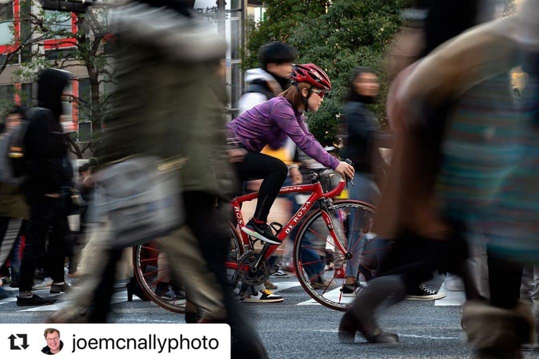 大菅小百合のインスタグラム：「とっても光栄なお仕事でした👏🏻😆✨ 久しぶりに自転車に乗った日🚴‍♀️  Thank you very much @joemcnallyphoto  @pearlizumijapan  ・・・ So, not the easiest of shoots. Legendary Japanese Olympian Sayuri Osuga agreed to work with me and pose on her bicycle in the midst of “The Scramble,” the busiest pedestrian crossing in the world, otherwise known as Shibuya. Shooting this while sitting in the gutter but still in the road w the crew standing over me so no vehicle runs over my legs. Flash mix at slow shutter!  ISO 64 1/10th at f13     70-200mm lens. Flash will keep her sharp while the world spins. You have to run and set her up in the midst of The Scramble and then you’ve got about 30 seconds to shoot. Lots of the time I couldn’t even see her there are so many people in that crossing. Missing Tokyo!  #TransformationTuesday #TravelTuesday #TakeMeBackTuesday #TuesdayVibes #TipTuesday #TuesdayThoughts #TopicTuesday #D850 #streetphotography #NikonAmbassador #NikonNoFilter @NikonUSA  #picoftheday #photoftheday #Japan」