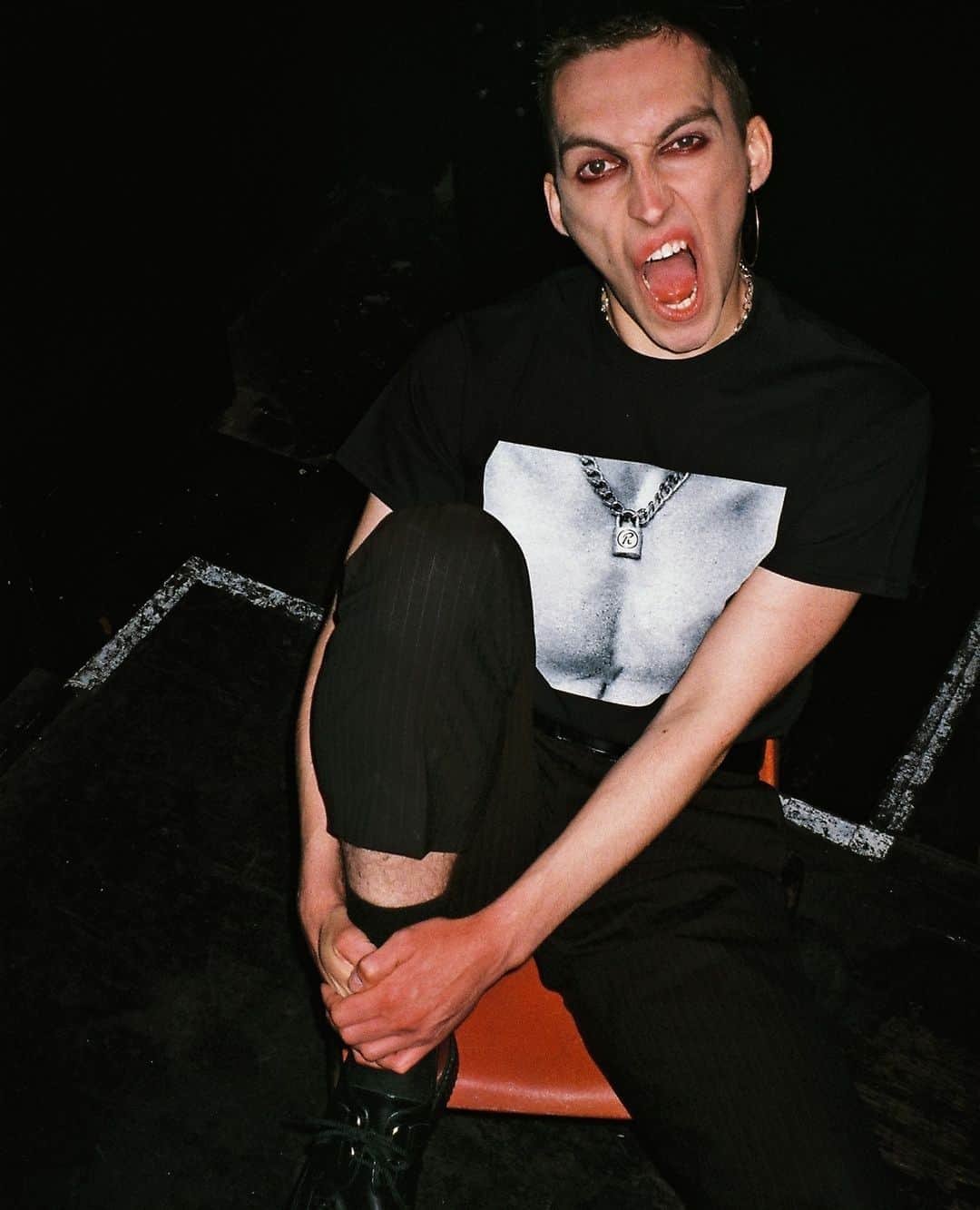 アンダーグラウンドのインスタグラム：「Joe wears the 21st century Tits T shirt. Algender and available from our online store.⁠ ⁠ ⁠ ⁠ ⁠ Photographer: @mrtomgoddard ⁠ Makeup Artist: @alicedoddsmakeup I ⁠ Hair Stylist: @mulletbabyy」