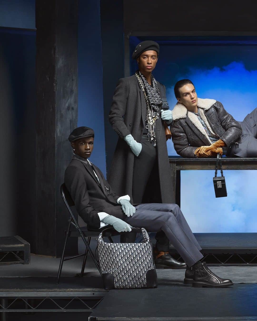 のインスタグラム：「Building on the mood and the visual effects of the show, photographer @StevenMeisel_ captures the #DiorWinter20 men's collection by @MrKimJones against a glass cube filled with mysterious, blue-tinted billowing clouds. And in a subtle nod to the House's haute couture heritage, a pair of opera gloves lends an elegant finishing touch to each look.」