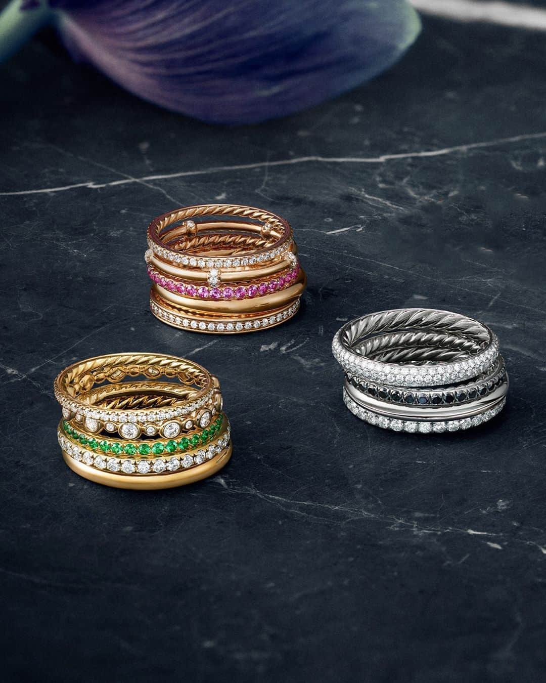 デビッドヤーマンのインスタグラム：「The art of layering. Select from classic Cable or hand-set tsavorites, pink sapphires and pavé diamonds to create your signature stack of wedding bands. #DavidYurman」