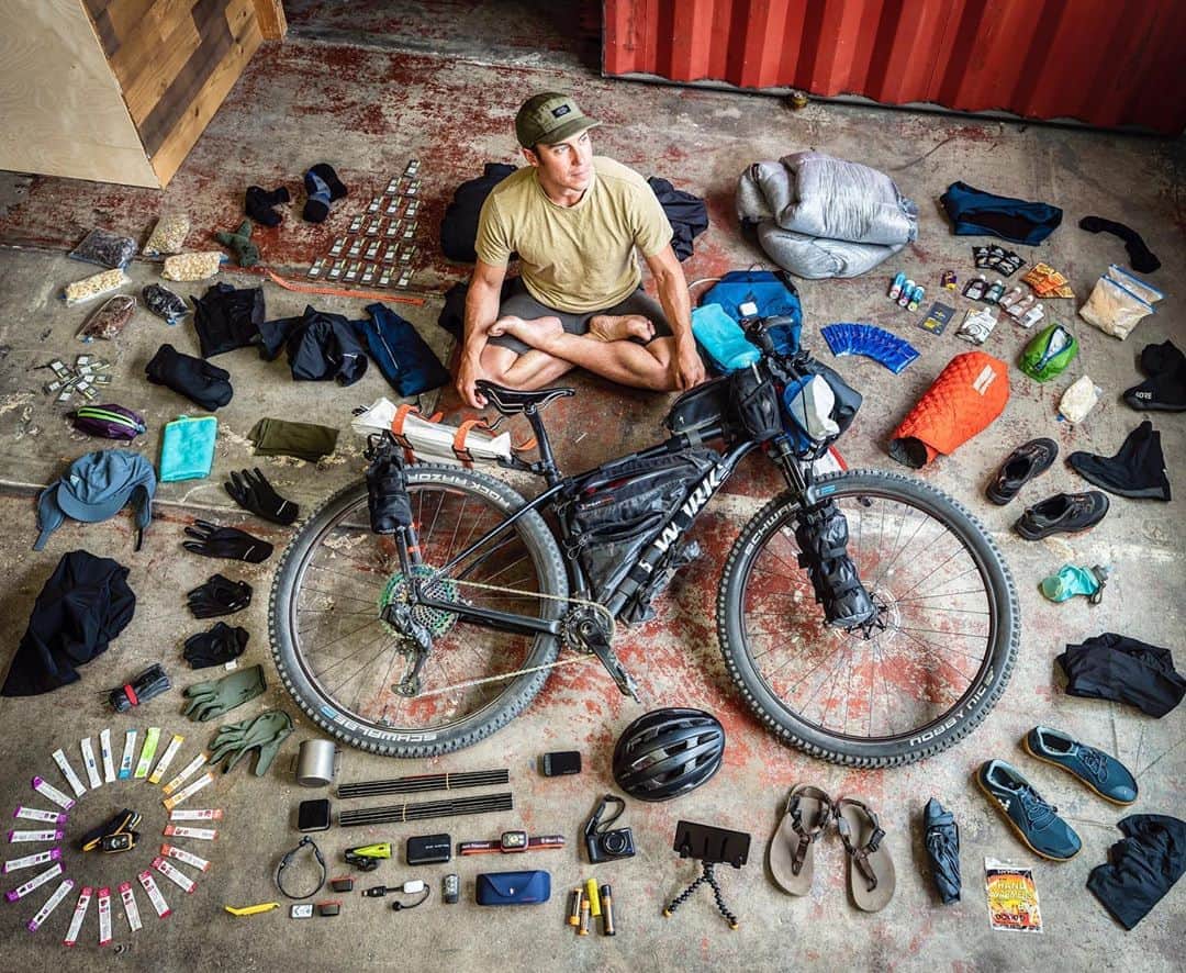 のインスタグラム：「Tomorrow we culminate a year of planning, route building, training & stress as we attempt to cross 900KM+ of Iceland’s interior unsupported from the farthest Eastern shore to West. From the very moment we reached out to the cartographer to build the route we know it may not be possible. With the amount of deep river crossings (our route runs across every major one) , soft sand and heinous weather that stands in our way, success is unlikely.... but possible. I’m hopeful but realistic as this route has not been done by bike and is near impossible unsupported. The silver lining is that the process of preparing has taught me a lot & I am grateful for that and the people it’s drawn me close to. I’ve decided to forego fundraising in order to focus on survival and documentation of the experience for y’all. Thanks to all who have sent words of encouragement. We are gonna need it! The day before I left @chrisorwig stopped by and captured this moment before I packed up. The only things that’s missing is the 25lbs of food we are carrying!  Total bike weight ~ 70lbs Track our GPS in my bio link   @ericbatty @emilybatty1 @adammorka @sonyalpha @lululemonmen @srammtb @zippspeed @wahoofitnessofficial @iamspecialized @sonyxperia @schwalbetires @nangausa @icelandair @ridefarr @tailfincycling @revelatedesigns」