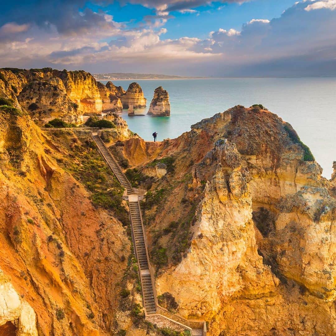 Lonely Planetさんのインスタグラム写真 - (Lonely PlanetInstagram)「😍Dreaming of a Portugal adventure?  From its rugged oceanside cliffs to golden beaches to tucked away lakes deep in the forest, Portugal's landscape offers a host "oohs and ahhs" around every corner.   Fuel your wanderlust and tap the bio link to discover 10 of our favorite natural wonders in Portugal.   Pictured: 1️⃣Sete Cidades 2️⃣Ponta da Piedade 3️⃣Porto Santo Beach 4️⃣Fisgas de Ermelo」8月19日 3時58分 - lonelyplanet