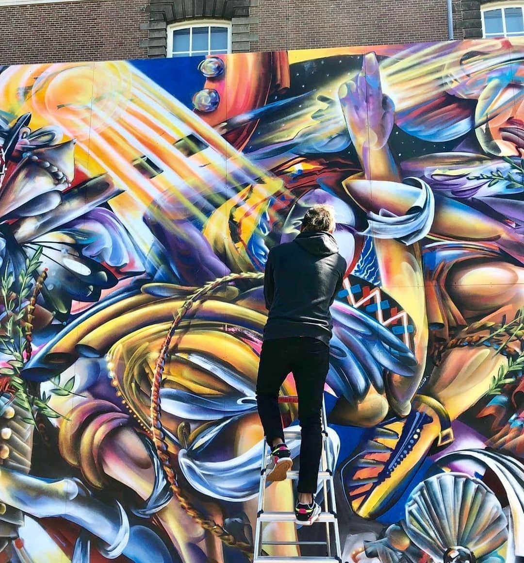 Grace Bonneyのインスタグラム：「Yatika Starr Fields is an Artist with emphasis on studio paintings and large-scale Murals. He is from Oklahoma and a member of the Osage, Cherokee and Muscogee Creek Nations and currently living and working in Tulsa as a fellow with the Tulsa Artist Fellowship. Yatika’s artistic endeavors has taken him around the world, working with institutions and Museums in a continuous dialogue to help broaden the views of Contemporary Native art today. His influences vary with range- often he takes his memories as a frequent source to expand upon. After graduating High School in Stillwater, OK he attended the Art Institute of Boston and then NYC for a decade on the East Coast- the urban environments quickly became an open source of visual and energetic inspirations that continue to influence his works today. In recent years his work has taken a shift to represent the contemporary politics we live in today tied together with historical and traditional context through explorations in Landscapes, representational motifs of culture and heritage mixed with the pop references of earlier works. His compositions are colorful and dynamic, leaving the viewer to move the eye and find relating elements to their own journey, an orchestrated landscape of unbounded possibilities is revealed.」