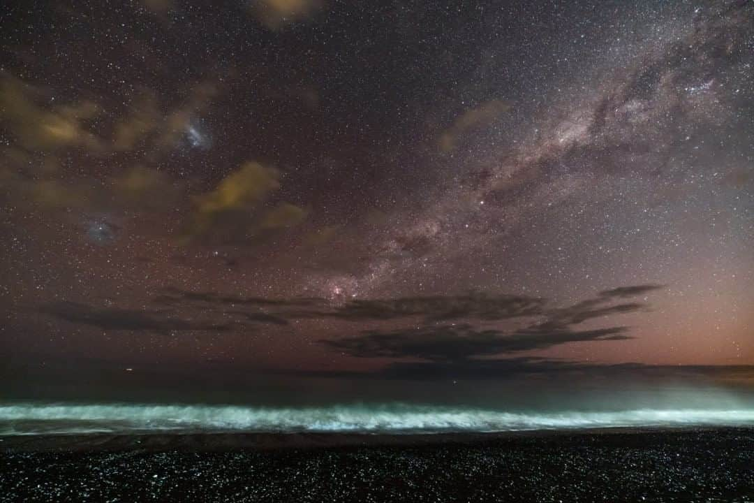 National Geographic Travelさんのインスタグラム写真 - (National Geographic TravelInstagram)「Photo by @babaktafreshi  The Milky Way and the Large Magellanic Cloud appear in the sky over the shore near Christchurch. I made this image during a lecture tour last year for the Royal Astronomical Society of New Zealand. A side light illuminated the foreground during this single-exposure photograph.  Explore more with me from Earth to the universe @babaktafreshi. #twanight #astrophotography #stargazing #newzealand」8月21日 13時09分 - natgeotravel