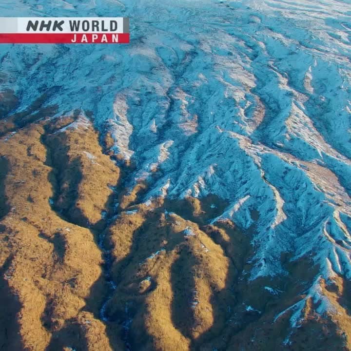 のインスタグラム：「🚁Get a different view of Japan! 👀 . 👉Watch the 5-part documentary series｜Japan From Above｜Free On Demand｜NHK WORLD-JAPAN website. . 👉Tap the link in our bio for more on the latest from Japan. . . #whatamilookingat #japannature #mountainpeak #japanmountain #waterfall #beautifuljapan #snowjapan #wildhorse #japanscenery #japanriver #wildjapan #snowypeaks #japantrip #stayhome #explorejapan #japantravel #discoverjapan #visitjapan #instagramjapan #japantravel #japan #JapanFromAbove #CradleOfTraditions #TreasureIslands #TheGreatWildNorth #LandOfThePrayers #GiftsFromTheMountains #nhkworld #nhkworldjapan #nhk」