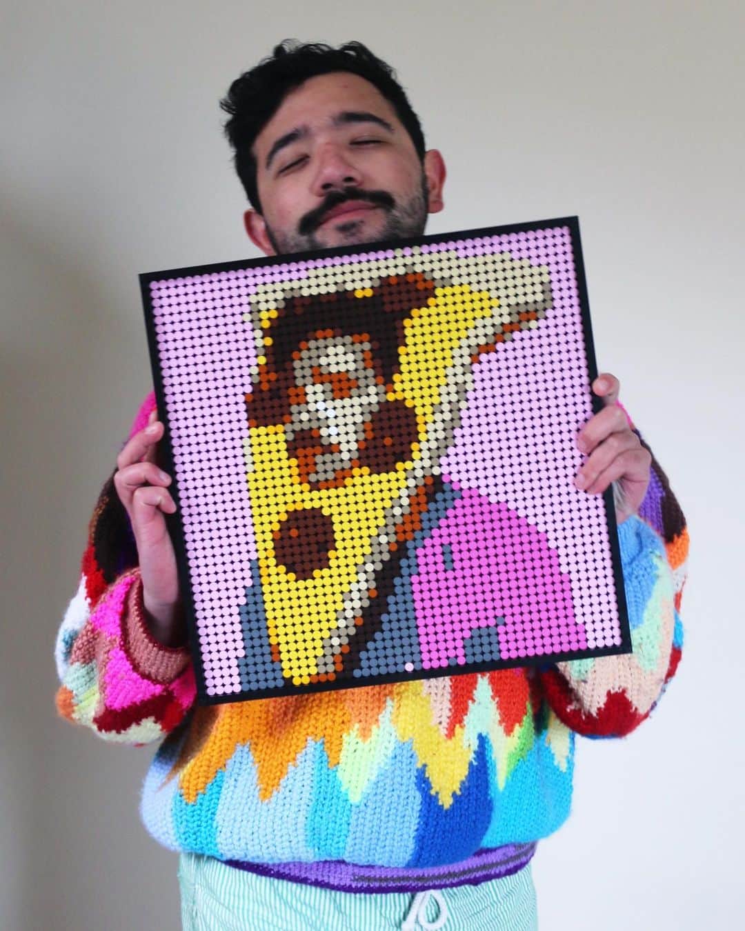 Phil Fergusonのインスタグラム：「So here is a my second #LEGOart piece! I thought with the colour range I was provided that I could really only stick with the same warmer tones, so PIZZA IT WAS!  It's a nice moment to be redoing old images of mine in a new way, especially in these times, reflection and creativity are two things that people put the pressure on to do and these LEGO Art sets have allowed me to let my creativity out without solely doing just crochet!  This is the last couple of days you can check out this and my other piece at the exhibition at Brisbane Powerhouse, if you're based in QLD.  @LEGO #ad」