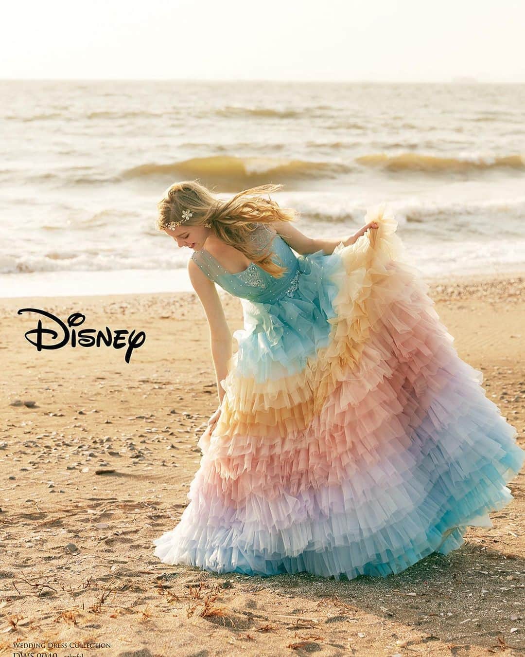 ACQUA　GRAZIE（アクア・グラツィエ）さんのインスタグラム写真 - (ACQUA　GRAZIE（アクア・グラツィエ）Instagram)「● DWS0040（colorful）﻿ アリエルをメインとした姉妹をイメージした虹色のドレス。﻿ 身頃に散りばめられた繊細なパールとオーロラのビーズは波や海の泡を﻿ 細かく重なったフリルはマーメイド達のヒレを表現。﻿ 姉妹達が彩る『リトル・マーメイド』の世界が詰まった一着。﻿ ﻿ �#アクアグラツィエ #ACQUAGRAZIE ﻿ #destinyline #デスティニーライン �#disney #disneyprincess #princess ﻿ #disney_weddingdresscollection  #weddingdress #dress  #colordress﻿ #ディズニー #ディズニー_ウエディングドレス﻿ コレクション #ディズニープリンセス #プリンセス ﻿ #カラードレス #アリエル #Ariel﻿ #リトルマーメイド #マーメイド #新作ドレス ﻿ #ウェディングドレス #ドレス﻿ #ディズニードレス #結婚式 #結婚﻿ #プレ花嫁 #卒花嫁 ﻿ #クラウディア #kuraudia﻿ ﻿ ディズニーオフィシャルホテルへの持ち込みは﻿ ご遠慮いただいております。﻿ ©Disney﻿」8月23日 19時00分 - acquagrazie