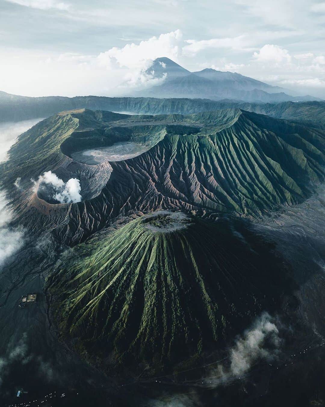 Instagramさんのインスタグラム写真 - (InstagramInstagram)「#HelloFrom Mount Bromo in East Java, Indonesia. ⁣ 🌋 ⁣ We are dreaming of this otherworldly view over the Tengger massif’s active volcanoes, Mount Bromo (foreground) and Mount Semeru (background). ⁣  ⁣ The craters lie in the middle of a vast plain called the “Sea of Sand,” a protected nature reserve. 🌋⁣ ⁣ Photo by @manueldietrichphotography」8月24日 0時09分 - instagram
