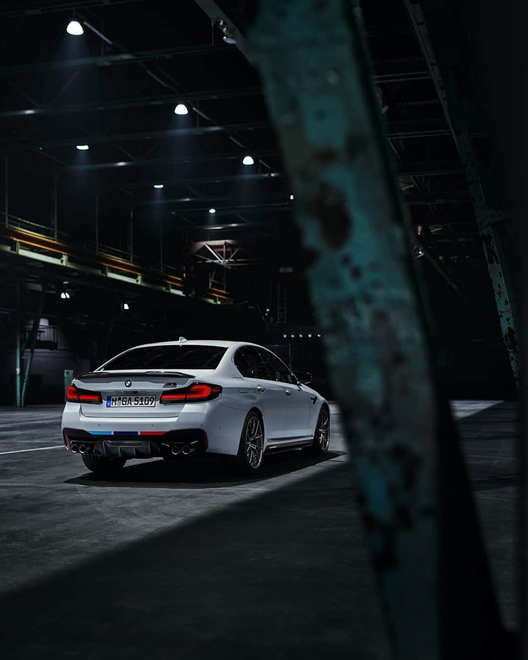 BMWのインスタグラム：「Savage. The BMW M5 Competition with M Performance parts. #TheM5 #BMW #M5 @BMWM  __ BMW M5 Competition Sedan: Fuel consumption in l/100 km (combined): 10.6–10.5. CO2 emissions in g/km (combined): 242–239. Further information: www.bmw.com/disclaimer.  	 Acceleration (0-100 km/h): 3.3 s. Power: 460 kW, 625 hp, 750 Nm. Top speed (limited): 250 km/h (with optional M Drivers Package: 305 km/h).」