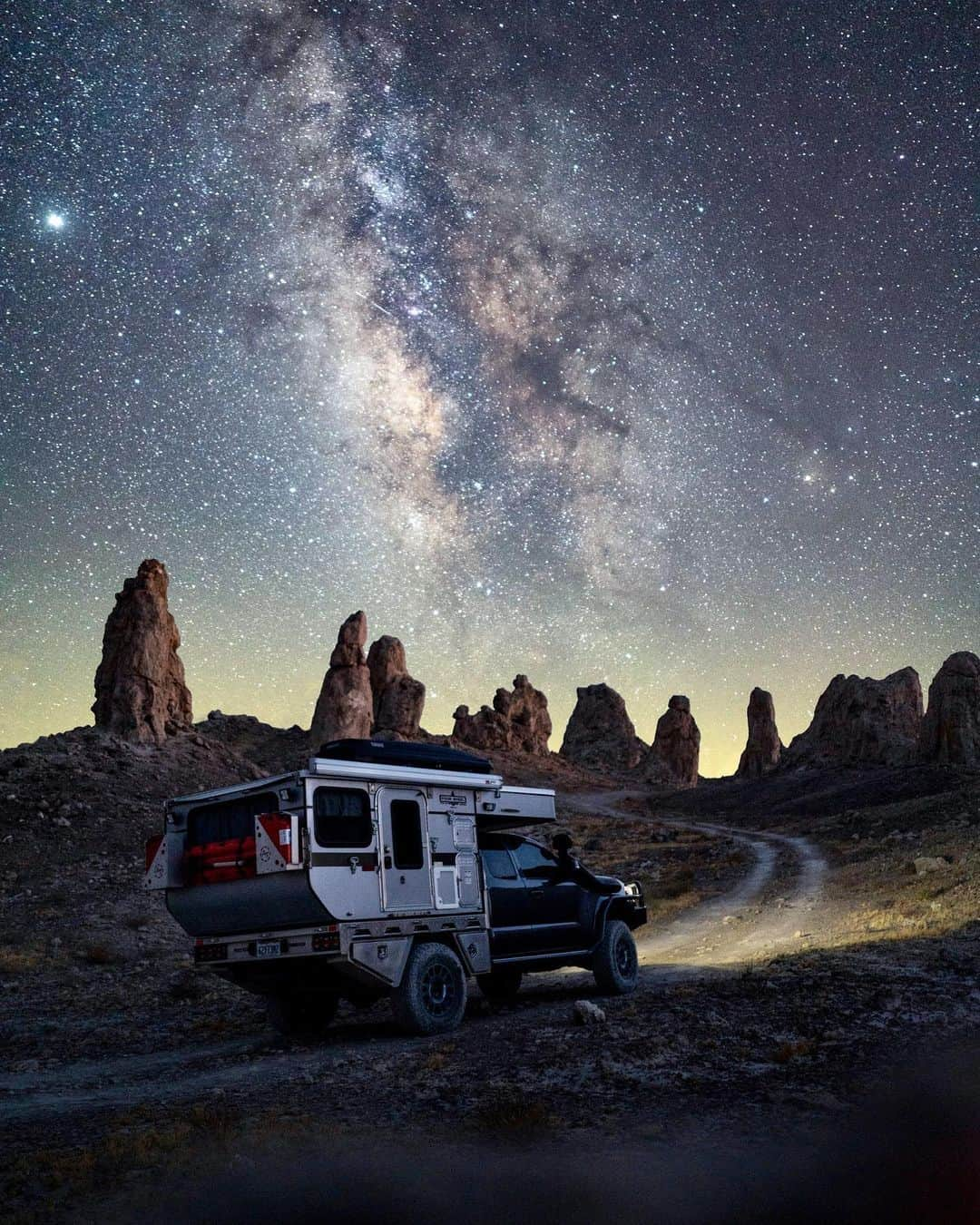 Travis Burkeのインスタグラム：「This past week I was finally able to sneak away to the desert to photograph my favorite subject: the Milky Way Galaxy! ⠀ This year has been a shock to the system, and a reboot to our desires to travel. More so than ever people are craving road trips to the lesser-known locations, off the beaten path, far away from highly trafficked areas--and understandably so!  ⠀ Safety and versatility are extremely important in every aspect of my life and the new Open Country A/T III all-terrain tires from @toyotires are exactly in line with what I look for in a tire; off-road capabilities for the more rugged routes, yet smooth and comfortable for long-distance drives on asphalt. ⠀ Due to COVID, I haven't been able to get out on the road much yet, but I'm excited to put these tires to the test in the snow, sand, mud, and every other type of terrain I find myself exploring. Where would you like to see me take the tires over the next few months? ⠀ #TOYOPARTNER #TOYOTIRES」