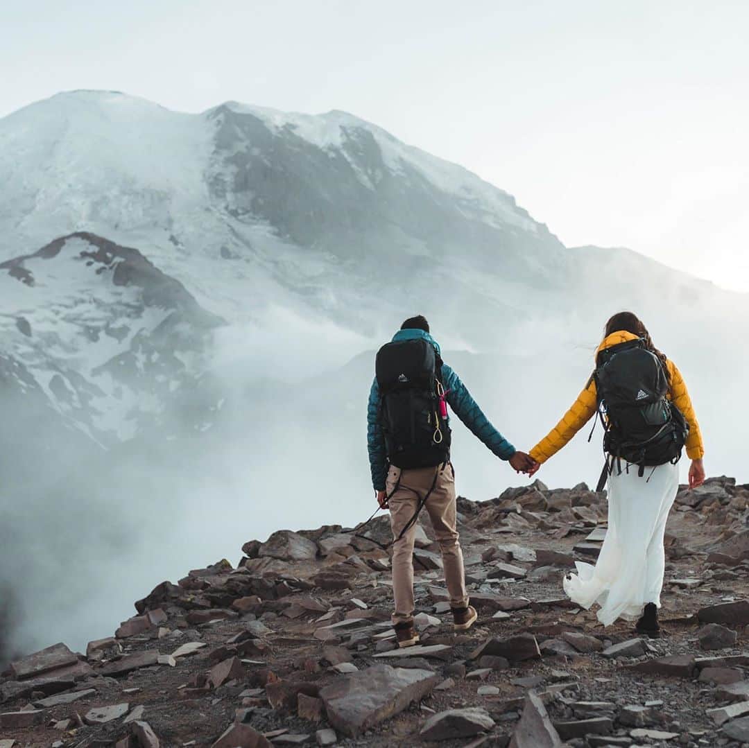 のインスタグラム：「Motivated by their love for one another and their shared love for the outdoors, @kathleendecina and her soon to be husband packed up their fancy clothing and headed to one of their favorite places to hike in Washington. 🤍  Photographer: @runningwildstudio Couple: @kathleendecina」