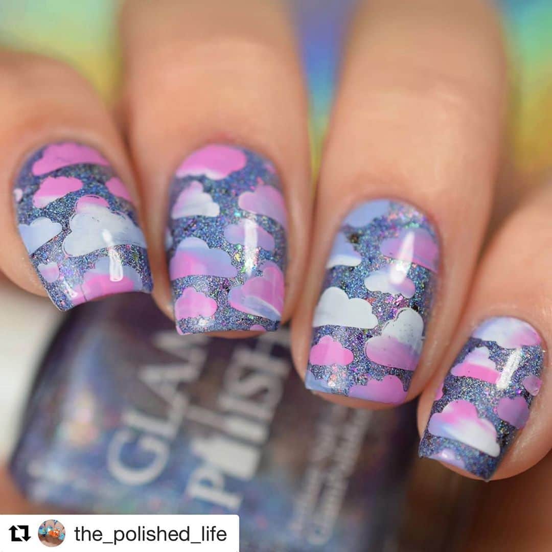 Nail Designsさんのインスタグラム写真 - (Nail DesignsInstagram)「Credit: @the_polished_life  ・・・ [Press Sample] Hello everyone! I have something really special from Glam Polish to share!! 😍 ☁️ I have the Holo-Maniacs group custom from Glam Polish!!  ☁️ Head In The Clouds - Indigo tinted holo with shifting iridescent flakies and shifting multchrome flakies. ☁️ Release Date: September 1st, 2pm EST USA, Glam Polish .com. au website. ☁️ Shown here in 2 coats plus a top coat!  ☁️ Stamped using @uberchicbeauty 2-03 plate. Stamping polishes are @paintedpolishbylexi Rose, Taro and Blanc Slate  ☁️ ☁️ ☁️ ☁️ ☁️ #glampolish #prsample #pr #indiepolishaddict #indiepolish #indiepolishlove #supportindies #indieswatch #nailpromote #nailarttutorial #nailswatch #nailswatcher #squarenails #nailpolishaddict  #glampolishchillinlikeavillain2 #holographicnails #holonails #holomaniac #holomaniacs #cloudnails #nailstamping #nailartstamping #uberchicbeauty #paintedpolish #gradientstamping」8月26日 8時33分 - nailartfeature