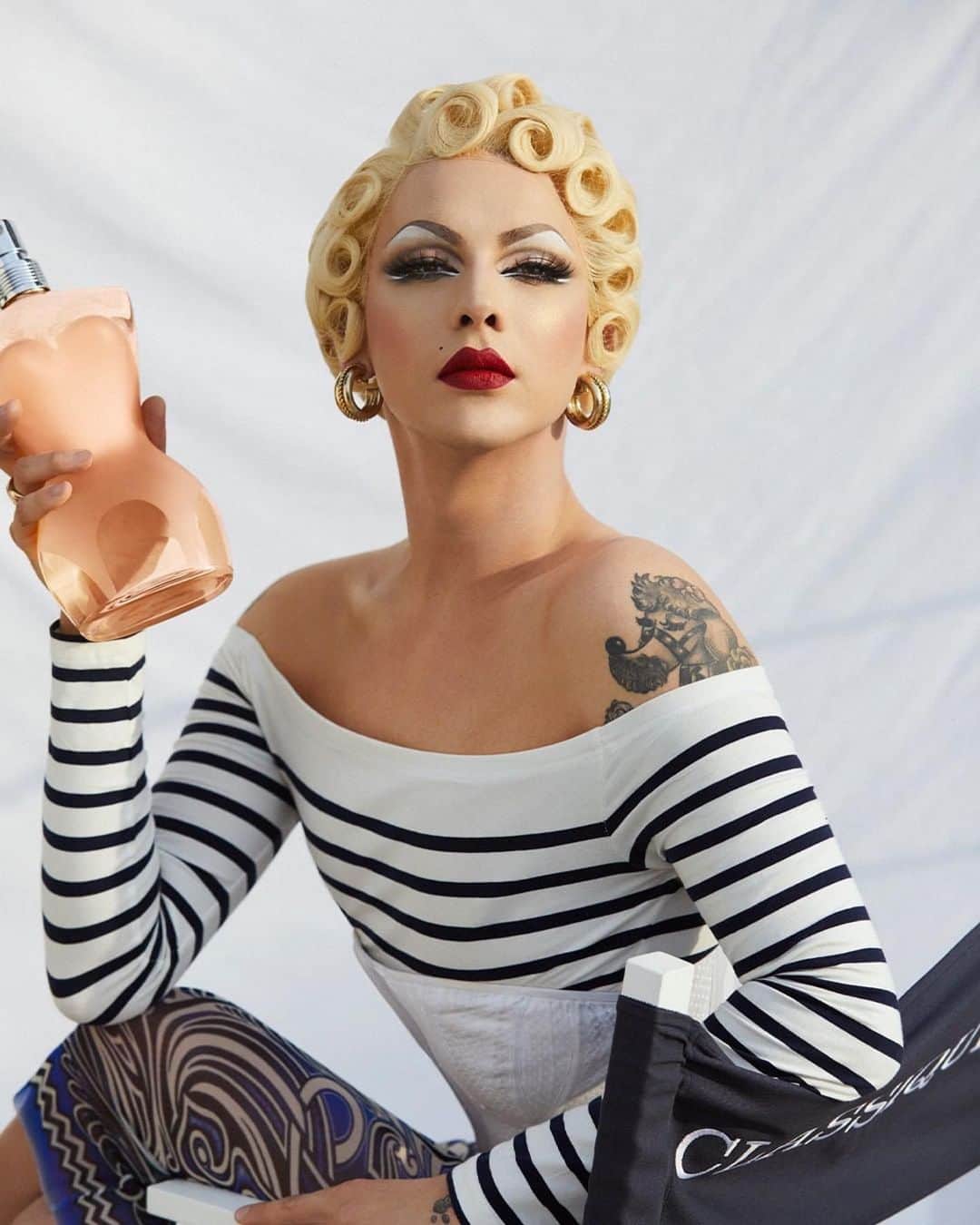 ヴァイオレット・チャチキのインスタグラム：「#Repost @jpgaultierofficial ・・・ Stripe a pose. @violetchachki ⁠ #Classique #JeanPaulGaultier」