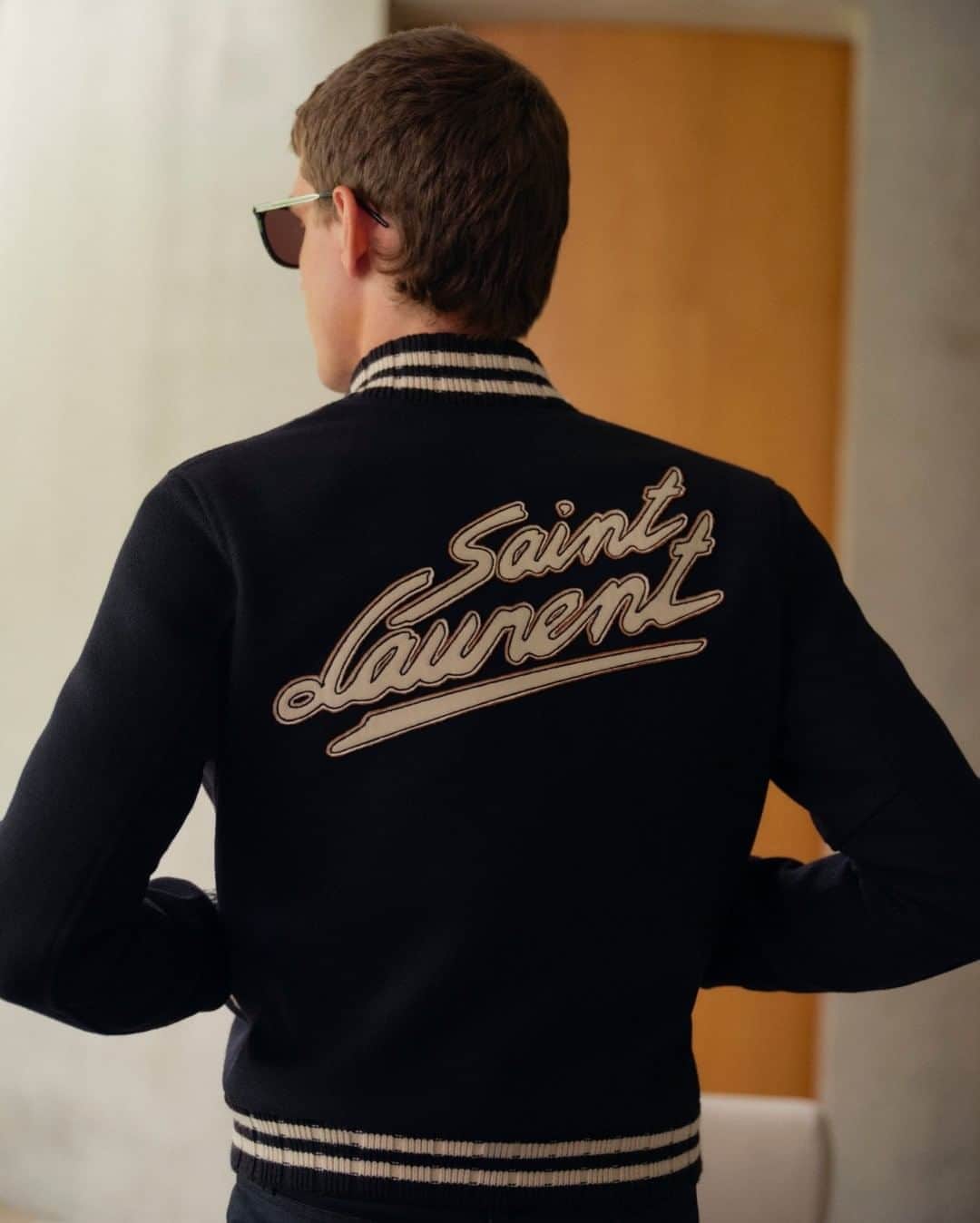 MR PORTERのインスタグラム：「You may already recognise SAINT LAURENT's 'Teddy' jacket – it's been worn by everyone from Post Malone to Messrs Mark Ronson, Jeff Goldblum and John Legend, so it's safe to say it's been pretty popular since its release in 2016. This season's iteration has just arrived, along with a whole host of new season pieces, on MR PORTER now. Head to the link in bio to discover the collection. #MRPORTER @ysl  🛍️ SAINT LAURENT - Teddy Leather-Trimmed Virgin Wool-Blend Bomber Jacket」