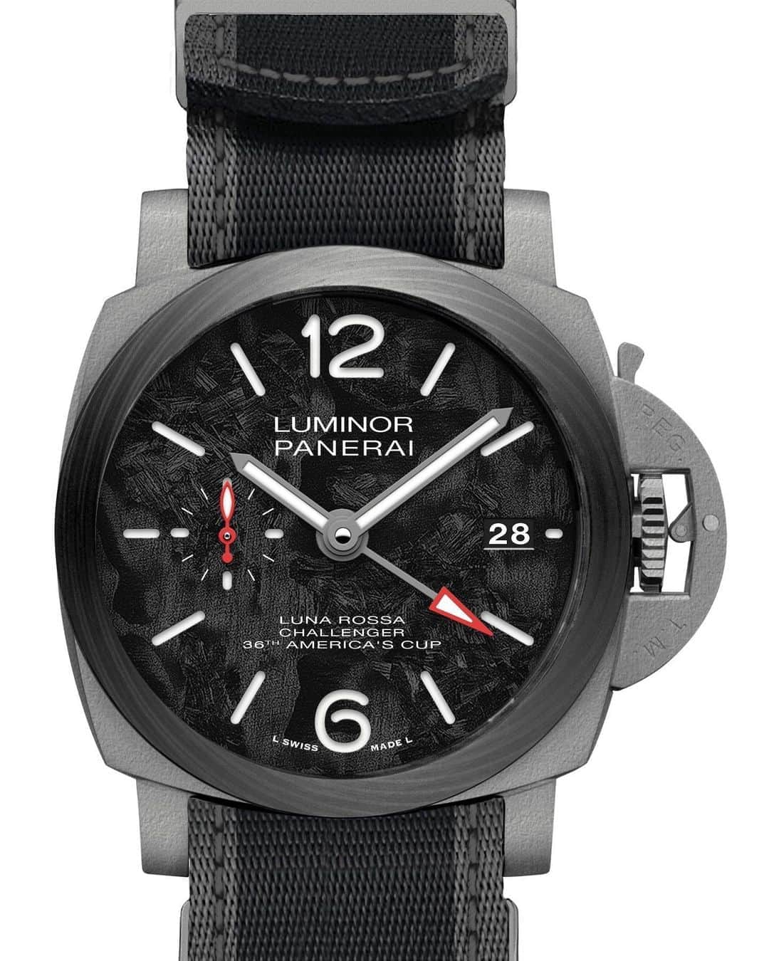 パネライのインスタグラム：「The Second watch in the release is a new Luna Rossa model, the #Panerai #PAM1096 Luminor GMT which is a limited edition of only 250 pieces. It is a 42mm model that features a sandblasted Titanium case with a Carbotech Bezel.   The sandwich dial features a new material known as Scafotech which is a sustainable composite which is made from Carbon Fiber residue collected from the hull and hydrofoils of the Italian teams AC75 yacht. With the creation of this material, no two watches will feature a dial that looks the same. Giving each of the 250 pieces a unique look.   The PAM1096 is powered by the P.9010/GMT in house automatic movement with 3 day power reserve. It is water resistant to 100 Meters and comes with a Black Alligator leather strap as well as a second rubber strap all wrapped up in a personalized Panerai box which utilizes some Luna Rossa Sail Cloth.   MSRP - $10,800  Is it a winner? Leave a comment and let me know #PaneraiCentral」