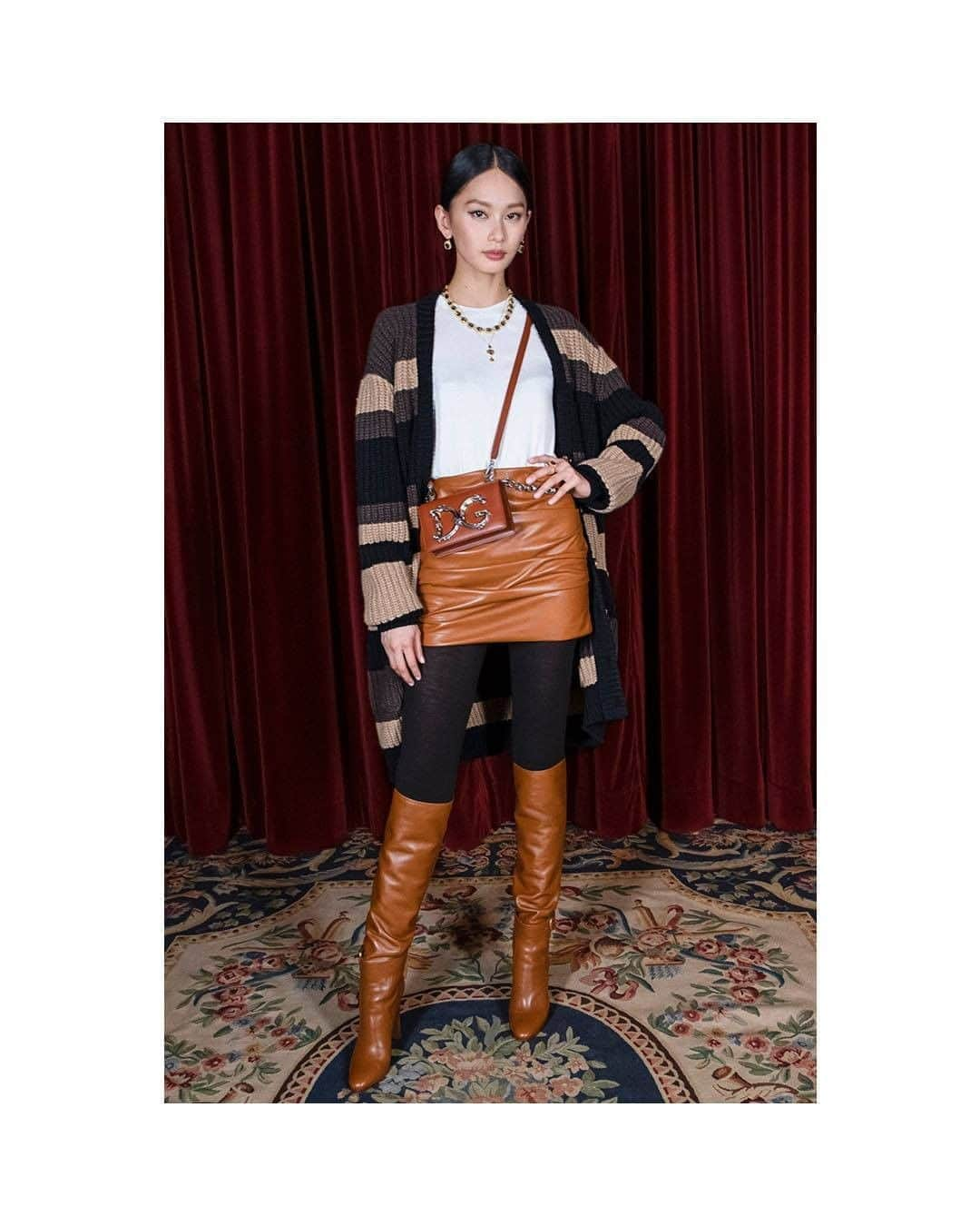 ドルチェ&ガッバーナさんのインスタグラム写真 - (ドルチェ&ガッバーナInstagram)「The #DGFW20 look includes a striped cashmere cardigan, a mini skirt and a small brown multi-chained #DGGirls bag.  Shot by @morellibrothers    Shop now at the link in bio.    #DGWomen #DolceGabbana」8月27日 20時00分 - dolcegabbana