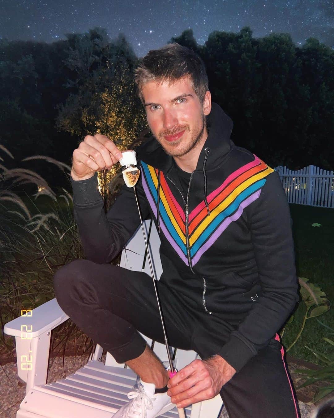 ジョーイ・グレーセッファのインスタグラム：「sweatpants are the official uniform of 2020 😌✌🏻 new @crystalwolf tracksuit is out now! get your rainbow fantasy at the link in bio 🌈」