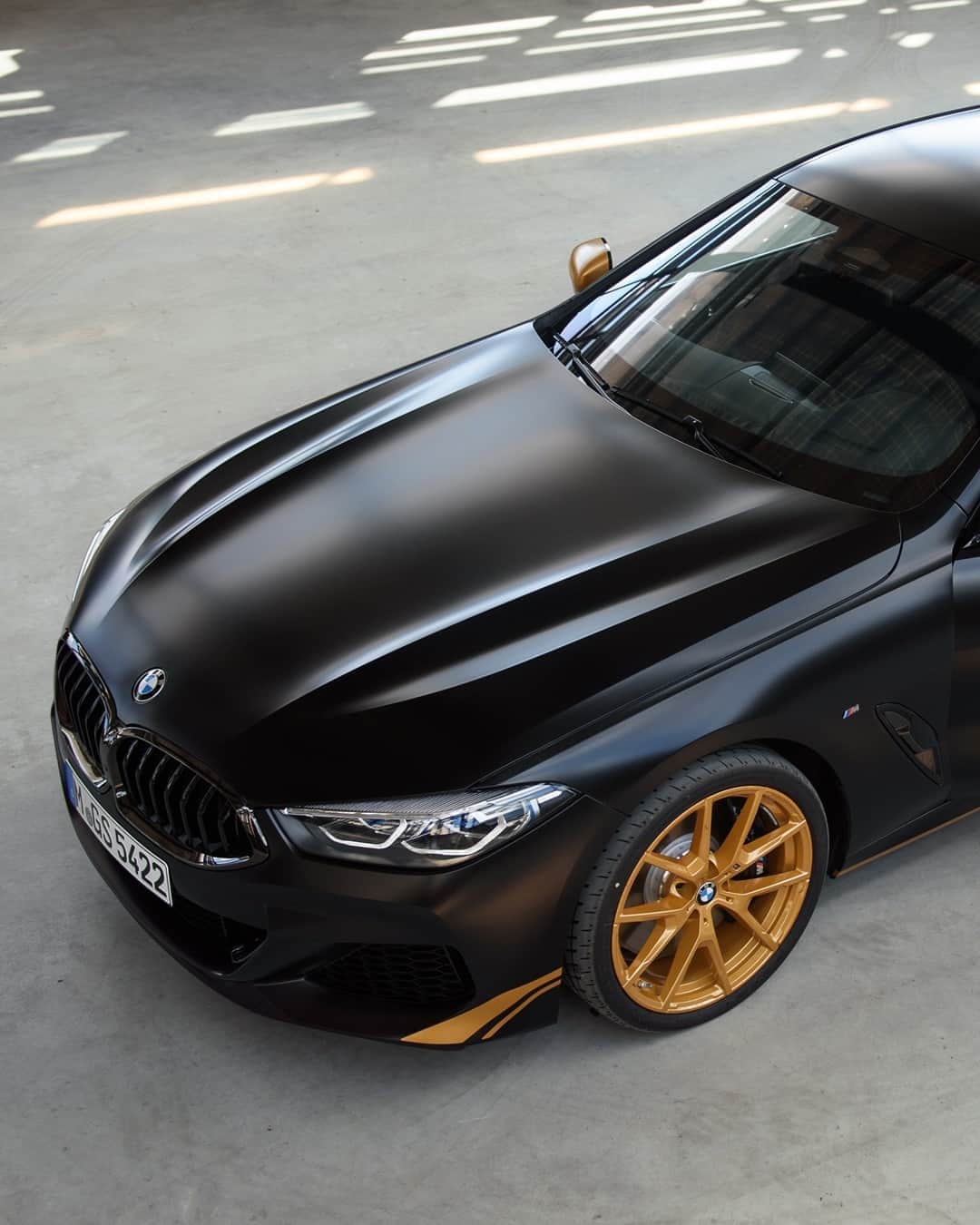 BMWのインスタグラム：「Struck by lightning. The BMW 8 Series Golden Thunder Edition. #THE8 #BMW #8Series __ BMW M850i xDrive Gran Coupé: Fuel consumption in l/100 km (combined): 10.0–9.9. CO2 emissions in g/km (combined): 229–226. Further information: www.bmw.com/disclaimer.  	 Acceleration (0-100 km/h): 3.9 s. Power: 390 kW, 530 hp, 750 Nm. Top speed (limited): 250 km/h.」