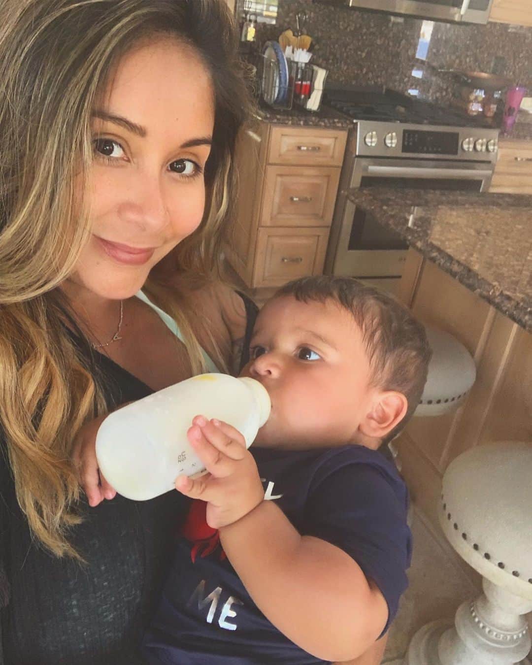 ニコール・ ポリッツィのインスタグラム：「He let me hold him like a newborn 🙏🏽😩 (he usually kicks and walks away cause he’s too cool 🙄 )」
