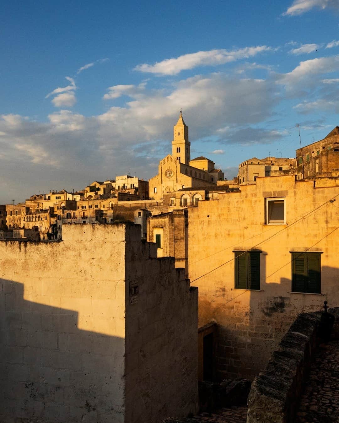National Geographic Travelさんのインスタグラム写真 - (National Geographic TravelInstagram)「Photo by @andrea_frazzetta  Seen from afar, Matera looks like a geometry of houses and stones that fit into the hills. The city has a wonderful labyrinth of small historic streets. The area has been a UNESCO World Heritage site since 1993. To see more photos from my travels, follow me @andrea_frazzetta. #italy #matera #basilicata」8月29日 5時06分 - natgeotravel