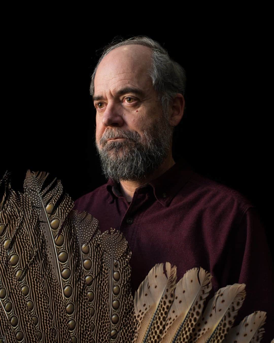 のインスタグラム：「Photo by Luján Agusti @lujanag  Ashland, Oregon: portrait of Pepper Trail, ornithologist and senior forensic scientist at the U.S. Fish & Wildlife Service Forensics Laboratory, the only full-service lab in the world dedicated to crimes against wildlife. Trail studies crimes against hummingbirds used as amulets, and he's identified more than 775 trafficked species­­, from penguins and cassowaries to hummingbirds and hornbills.  Check out Nat Geo's link in bio for more on this story.」