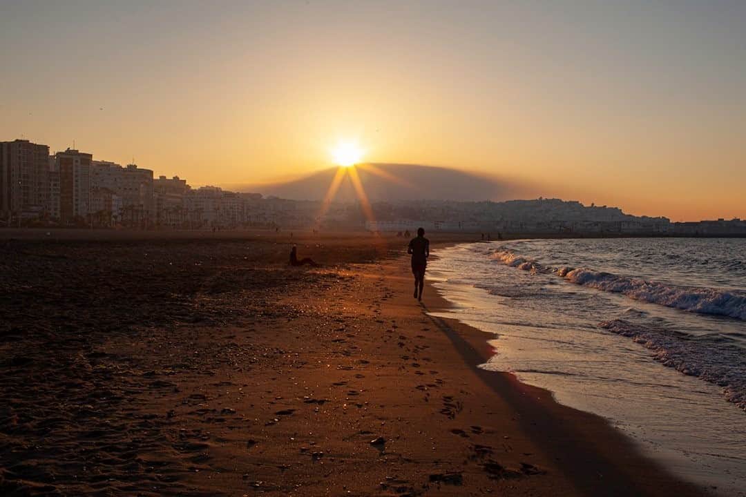 National Geographic Travelさんのインスタグラム写真 - (National Geographic TravelInstagram)「Photo by Matt Borowick @mborowick  I walked along the sandy shores, breathing in the warm sea air in Tangier, Morocco. Follow @mborowick for more pictures like this. #sunset #tangier #Morocco #beach #summer」8月31日 1時06分 - natgeotravel