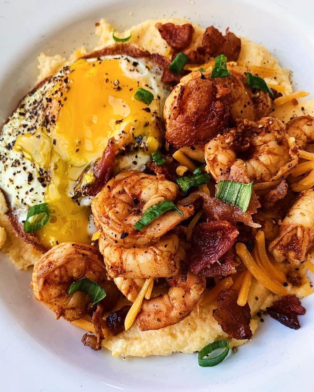 Flavorgod Seasoningsさんのインスタグラム写真 - (Flavorgod SeasoningsInstagram)「🍤🍚KETO SHRIMP AND BREAKFAST CHEESY GRITS🍚🍤⁠ -⁠ Customer:👉 @ketoassbih⁠ Seasoned with:👉 #Flavorgod Lemon & Garlic Seasonings⁠ -⁠ KETO friendly flavors available here ⬇️⁠ Click link in the bio -> @flavorgod⁠ www.flavorgod.com⁠ -⁠ "This morning I was feeling shrimp mood but breakfast shrimp, and AINT nothing more classic than a shrimp and grits for breakfast! I made the grits with frozen cauliflower (you cook first and then pulse in a food processor) . I cooked some thiccc bacon ends and seasoned the shrimp in a lemon garlic seasoning from @flavorgod , lemon juice, and Cajun seasoning. Don’t forget that perfect ooey gooey egg for extraaaaa flavor."⁠ -⁠ Flavor God Seasonings are:⁠ 💥ZERO CALORIES PER SERVING⁠ 🔥0 SUGAR PER SERVING ⁠ 💥GLUTEN FREE⁠ 🔥KETO FRIENDLY⁠ 💥PALEO FRIENDLY⁠ -⁠ #food #foodie #flavorgod #seasonings #glutenfree #mealprep #seasonings #breakfast #lunch #dinner #yummy #delicious #foodporn」8月31日 8時01分 - flavorgod