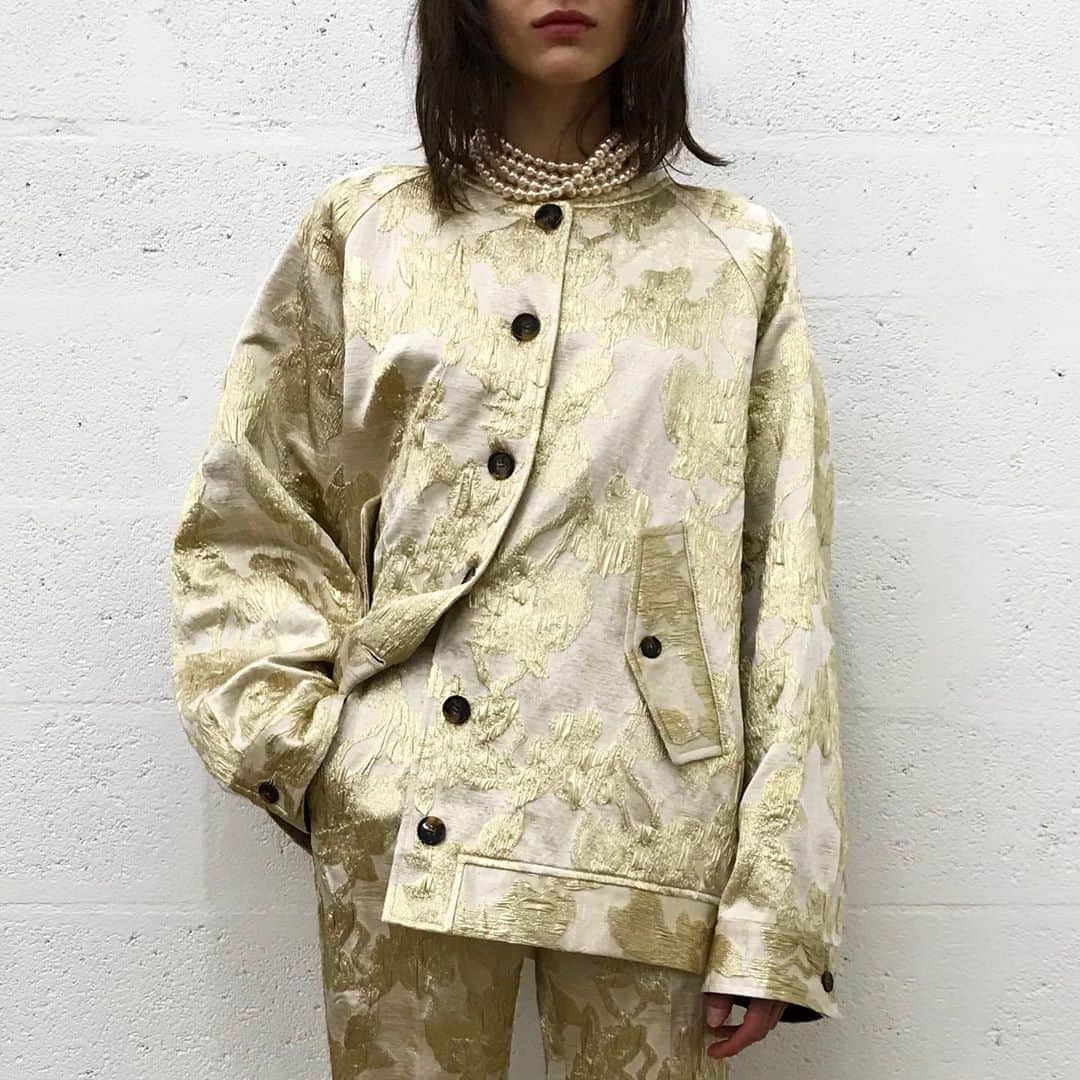 のインスタグラム：「Inspired by a Baseball Jacket , cut in a gold lurex Jacquard and worn with matching pants - part of my favourite looks of the last 6 seasons .. the idea of wearing a suit inspired by sportswear - those 2 pieces you throw on when heading for the gym or for a run .. throw this on when heading out for a drink or a dance , or a date, or just to do some grocery shopping 🛍 ✨#baseball #gym #suit #activewearfashion #activelifestyle #favouritelooks」