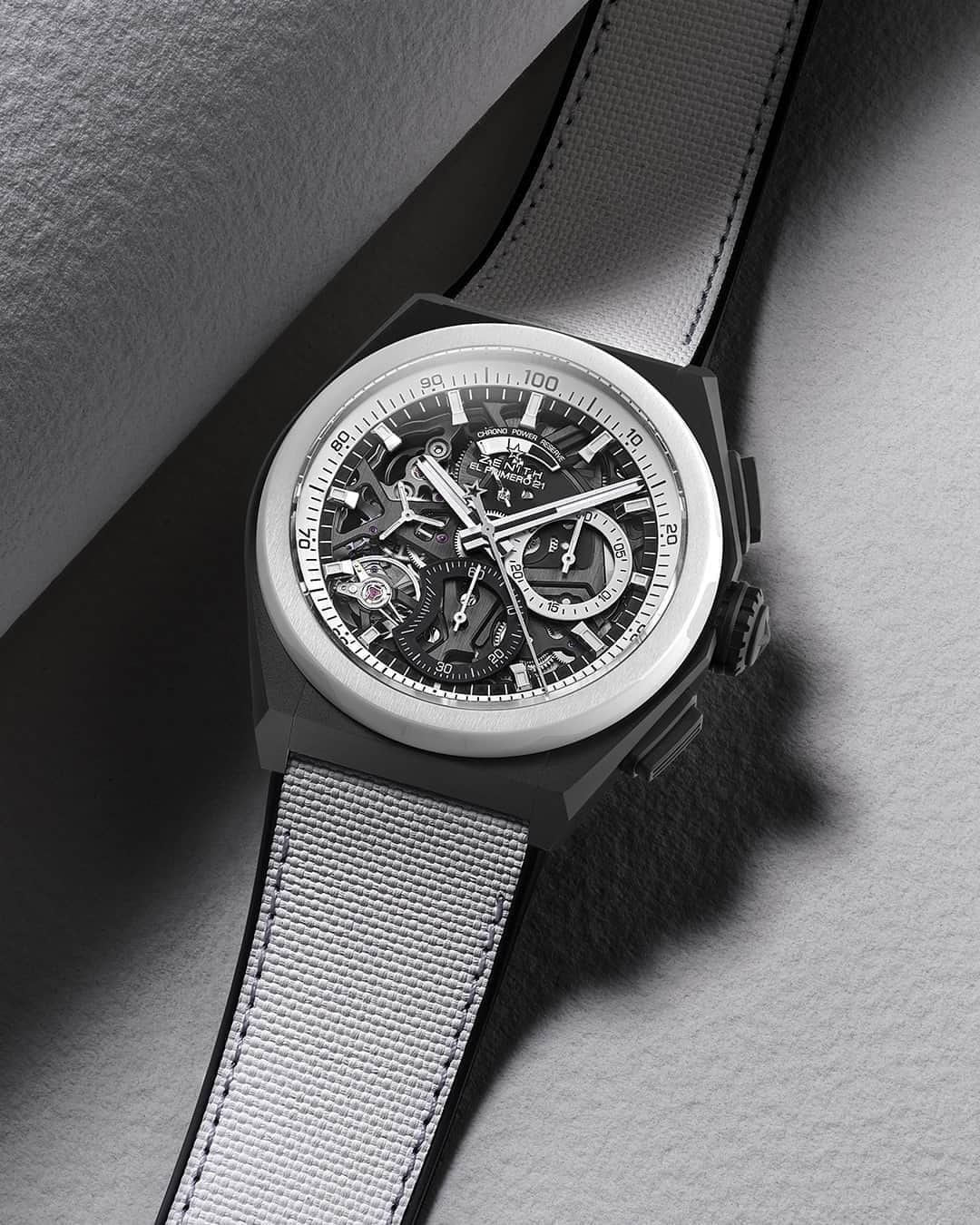 ゼニスのインスタグラム：「#Defy21: Foregoing colours to allow the 1/100th of a second chronograph to stand out even more: DEFY 21 Black & White edition. Exclusively available at Zenith Boutiques and our online shop.  #Zenith #ZenithWatches #Watches #Watch #Watchesofinstagram #Watchfam #WatchoftheDay #Luxury #WatchAddict #Watchcollector #Horology #DailyWatch #ElPrimero #Chronograph #WatchAlert #BlackandWhite」