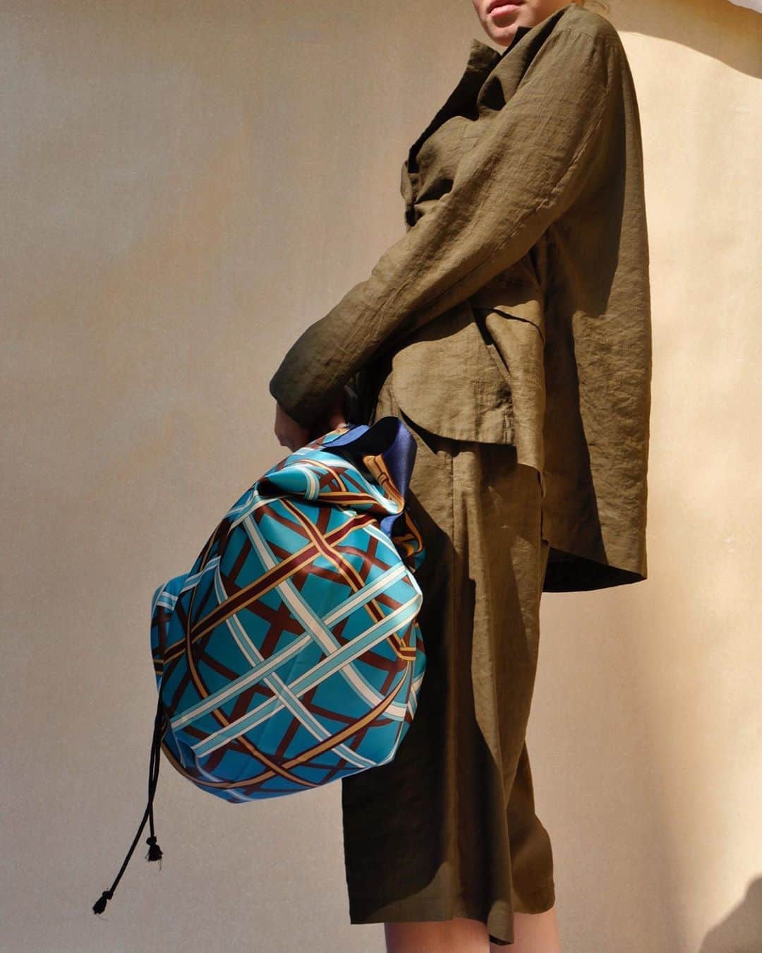 のインスタグラム：「Our iconic foulard bag on army suit #collectionpriveeofficial  • • • • #newcollection #ss21 #collectionpriveeaccessories #foulardbag #army #womansuit #bermuda #fashionista #new #tfw #mfw #style #madeinitaly #contemporary #iconic #womenstyle」