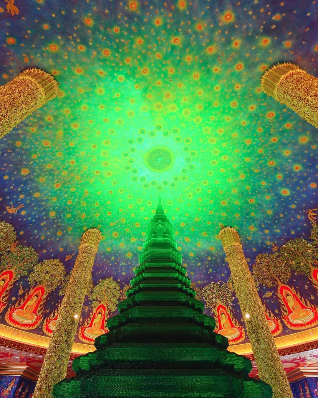 田島知華のインスタグラム：「【Thailand🇹🇭Bangkok】A temple where you can enjoy the colors. 満天の星空が輝いているような天井画が美しい、ワット・パクナム寺院。  360度鮮やかな色に包まれてワクワクする気持ちと、お寺ならではの神聖な静けさに心が落ち着きます。  ワット・パクナムを含むバンコク旅については『海外ひとり旅ガールの便利帖』でもご紹介しています📚 Copyright ©︎ TAJIHARU  PENTAX K-1 MarkⅡ  HD PENTAX-D FA 15-30mmF2.8ED SDM WR _ #たじはるトリップ #TAJIHARU_thailand #pentaxk1 #pentaxk1mkii #タイ #バンコク #女子旅 #旅ガール #カメラ女子 #thailand #bangkok #watpaknam #วัดปากน้ำภาษีเจริญ #visitthailand #visitbangkok #wonderful_places #beautifuldestinations #beautifulplace #earthpix #discoverglobe #discoverearth #awesome_phototrip」