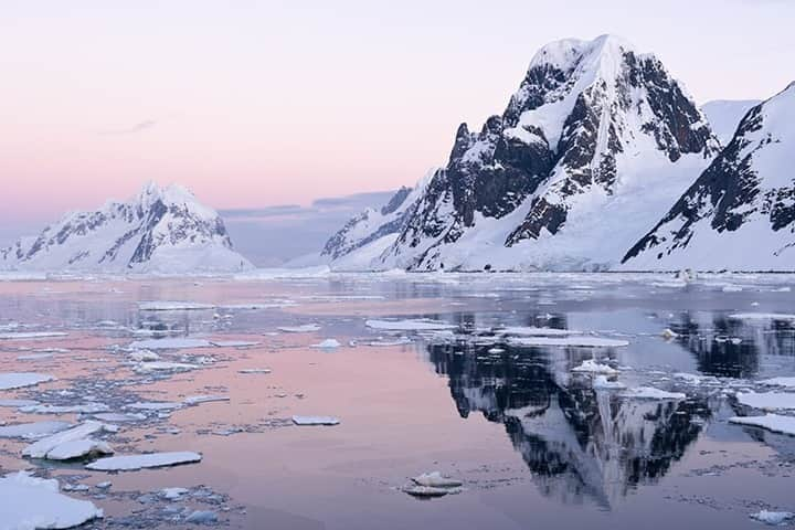 National Geographic Travelさんのインスタグラム写真 - (National Geographic TravelInstagram)「Photo by @daisygilardini  I love photographing Antarctica early in the southern summer, when sunsets turn into sunrises and you can stay up all night photographing the changing light on icebergs and the sea ice. I took this shot just before calling it a day—at 1 a.m. It's so peaceful and refreshing to follow nature's simple rhythms! Follow me @DaisyGilardini for more images and stories behind the scenes. #sunset #landscapephotography #Antarctica #climatechange #climatechangeisreal」9月2日 5時05分 - natgeotravel