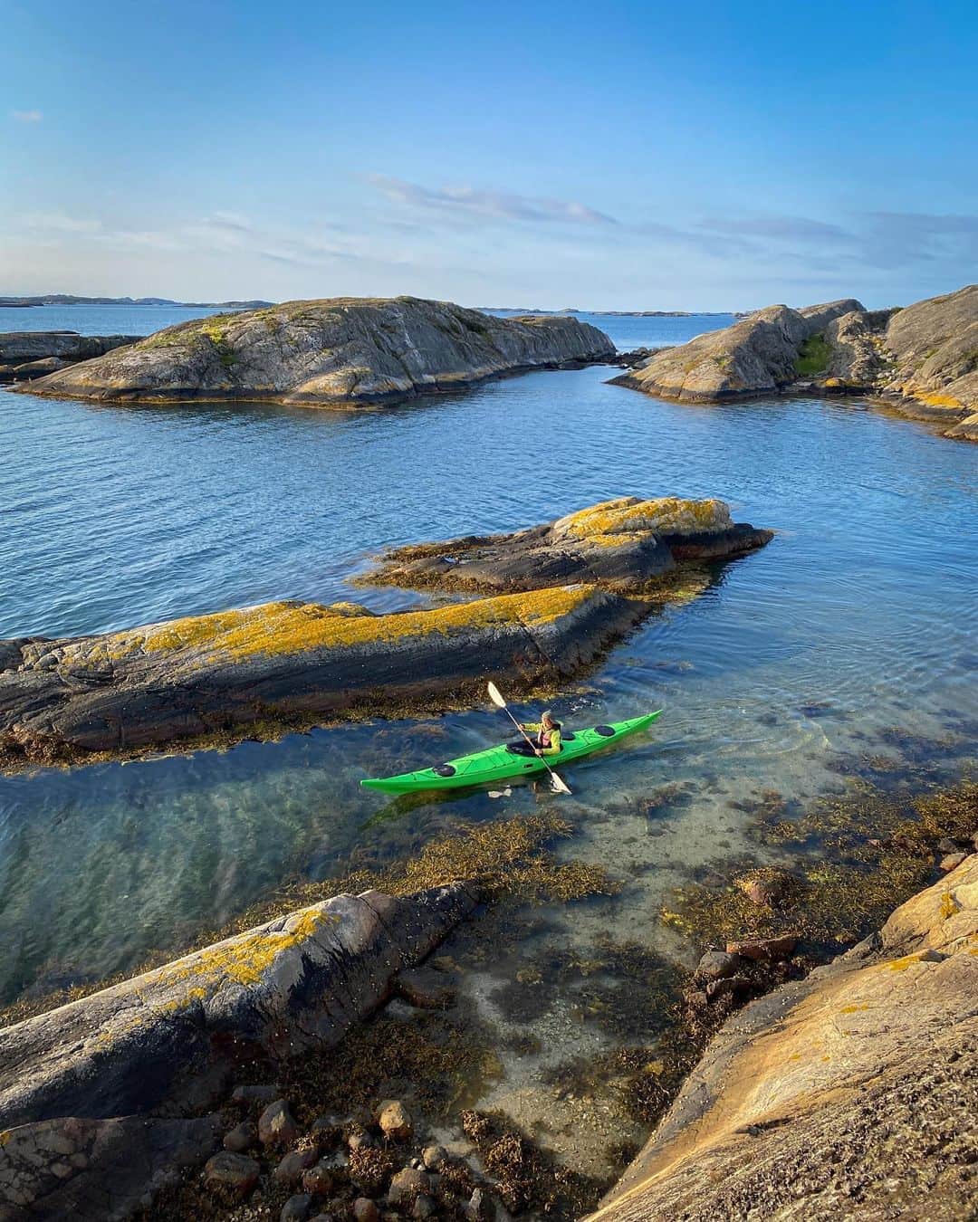 National Geographic Travelさんのインスタグラム写真 - (National Geographic TravelInstagram)「Photos by @justin.jin  My son Jinee, 11, and I embarked on a kayak journey around the Koster archipelago, a protected reserve off Sweden’s west coast. The landscape, dominated by smooth bedrock, bears witness to volcanic activity and subsequent wear due to the Ice Age. We camped on an uninhabited rock. Please follow me @justin.jin for more stories and images from around the world. #sweden #sea #koster #island #kayak」9月2日 1時15分 - natgeotravel