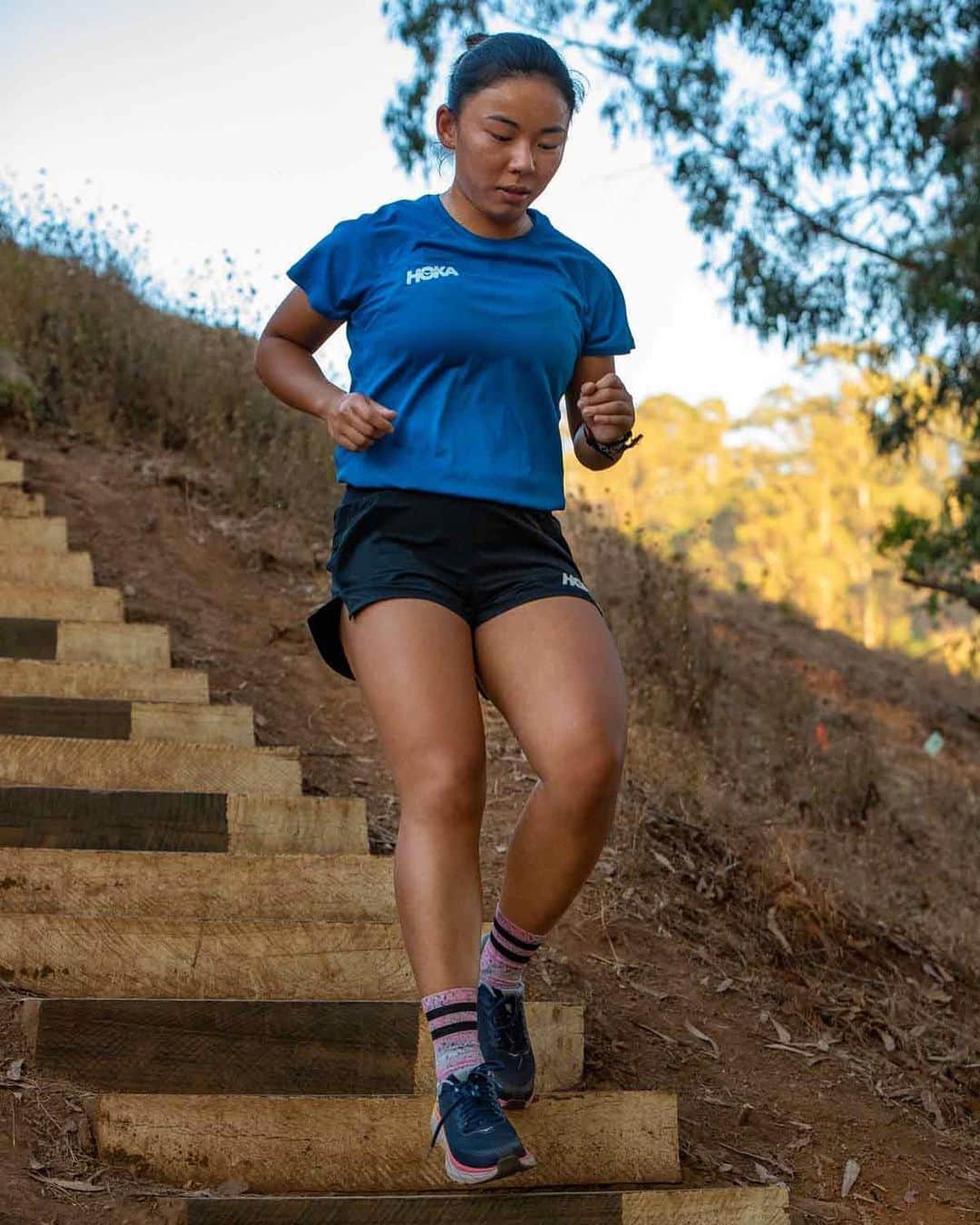 ホカオネオネのインスタグラム：「(Part 2/2) "In May 2018 I had to put aside my running shoes because of a serious stress fracture on my right tibia. All of a sudden it felt like I was sidelined in my own playing field: the friends I’ve made in the running communities were no longer around, I got fired from my first job out of college, and I started to feel that I no longer belonged. There were a lot of misconceptions about how my communities and sense of belonging was “earned” through fast times and frequent showing up. During my recovery period, I realized that running is a relationship with myself and I was too attached to the preconceived notion about what a “good runner” means and who is “someone that belongs”. Instead, running is a way we show up to ourselves in its most authentic form, no judgement, no better or worse, just being there. When I recovered from my injury 4 months later and went on the first few baby runs, I told myself to be patient and kind, because I live in this body that allows me to explore and challenge, and it didn’t have to go out and “earn” anything for me to love myself unconditionally."  - Carissa Yao on her relationship with running. You can read more from Carissa in her blog post (link in bio). #TimeToFly #HumansOfHOKA  📸 @bryanwalkerting」