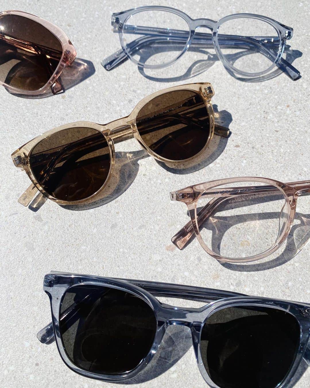 Warby Parkerのインスタグラム：「Presenting the crystal frames that our customers return to time and time again 🤩 These bestsellers represent an array of vivid hues and easy-to-wear shapes that were created to compliment any face—each pair is made from high-quality cellulose acetate, which retains its original, vibrant color over time. (In other words, they’re total keepers.)   Pictured here: Nancy in Rose Crystal, Watts in Pacific Crystal, Wright Narrow in Nutmeg Crystal, Durand in Rose Water, and Griffin in Pacific Crystal✨」