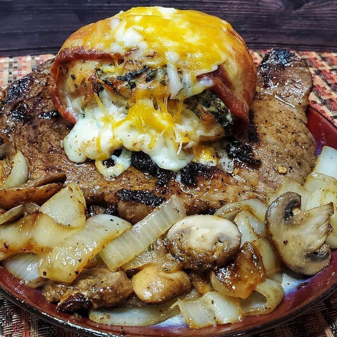 Flavorgod Seasoningsさんのインスタグラム写真 - (Flavorgod SeasoningsInstagram)「stuffed chicken breast atop a ribeye steak, and surrounded with grilled onions⁠ -⁠ By Customer: @ketobrawn using our Steak & Chop Rub!!⁠ -⁠ Add delicious flavors to any meal!⬇⁠ Click the link in my bio @flavorgod⁠ ✅www.flavorgod.com⁠ -⁠ "We give you Sticken !!! 🤣😂⠀⁠ Couldn't decide between steak or chicken so we had both. Proudly pearching a stuffed chicken breast atop a ribeye steak, and surrounded with grilled onions and shrooms... The steak is liberally rubbed with flavorgod Steak rub and Garlic Lovers seasoning and marinaded all day long.... Hope ya'll have a good night 🥰🥩🍗👍"⁠ -⁠ Flavor God Seasonings are:⁠ 💥ZERO CALORIES PER SERVING⁠ 🔥0 SUGAR PER SERVING ⁠ 💥GLUTEN FREE⁠ 🔥KETO FRIENDLY⁠ 💥PALEO FRIENDLY⁠ -⁠ #food #foodie #flavorgod #seasonings #glutenfree #mealprep #seasonings #breakfast #lunch #dinner #yummy #delicious #foodporn」9月3日 10時01分 - flavorgod